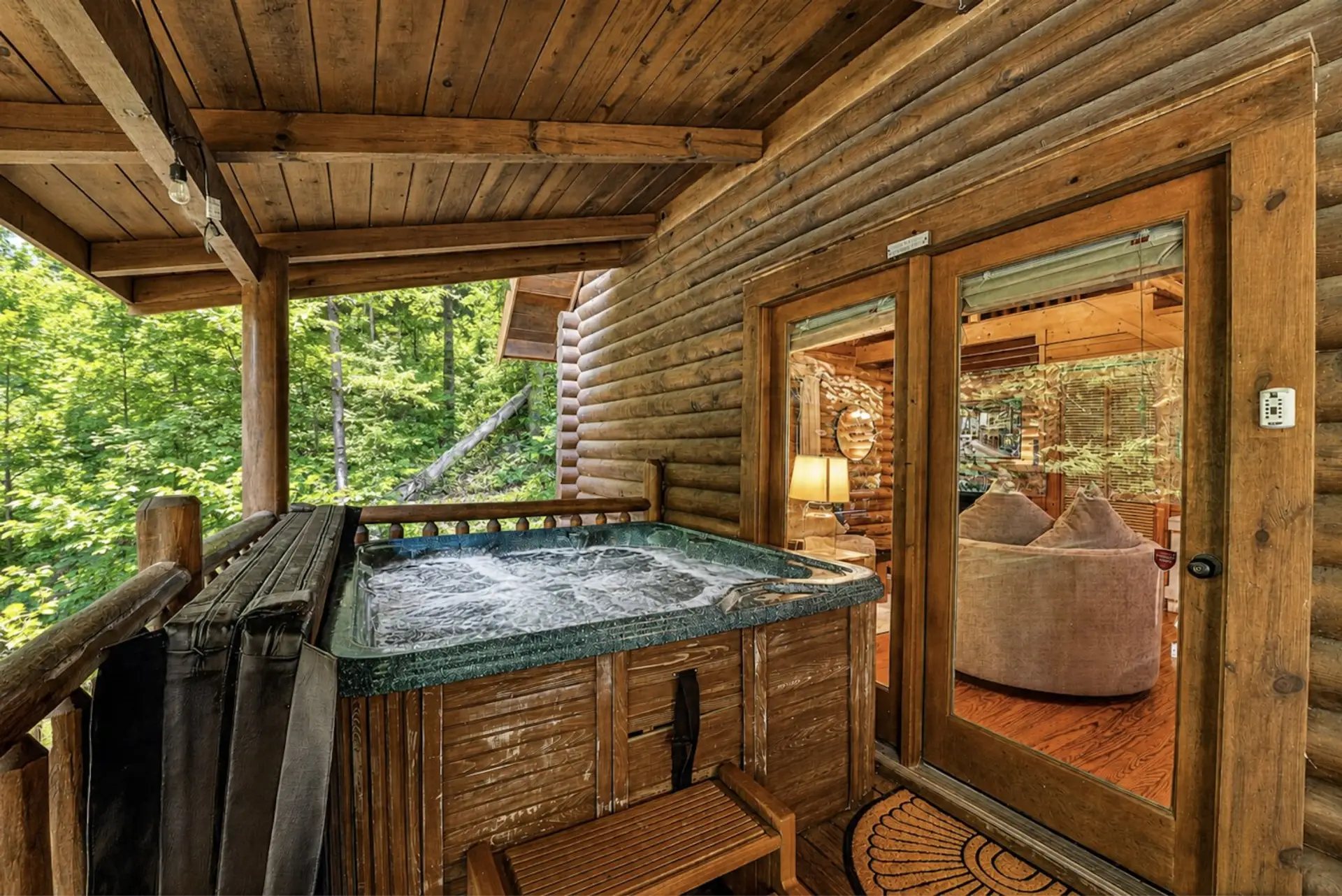 Enjoy a soak in the hot tub, perfect way to unwind after adventuring in the Smokies
