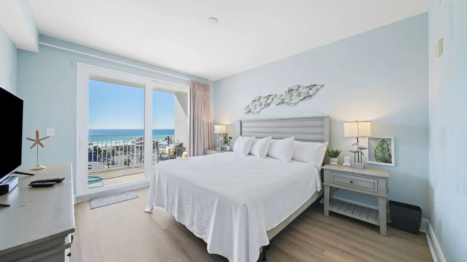 Primary Bedroom with King Size Bed, Ocean Views, Flat Scree TV, Private Balcony Access and Ensuite Bathroom