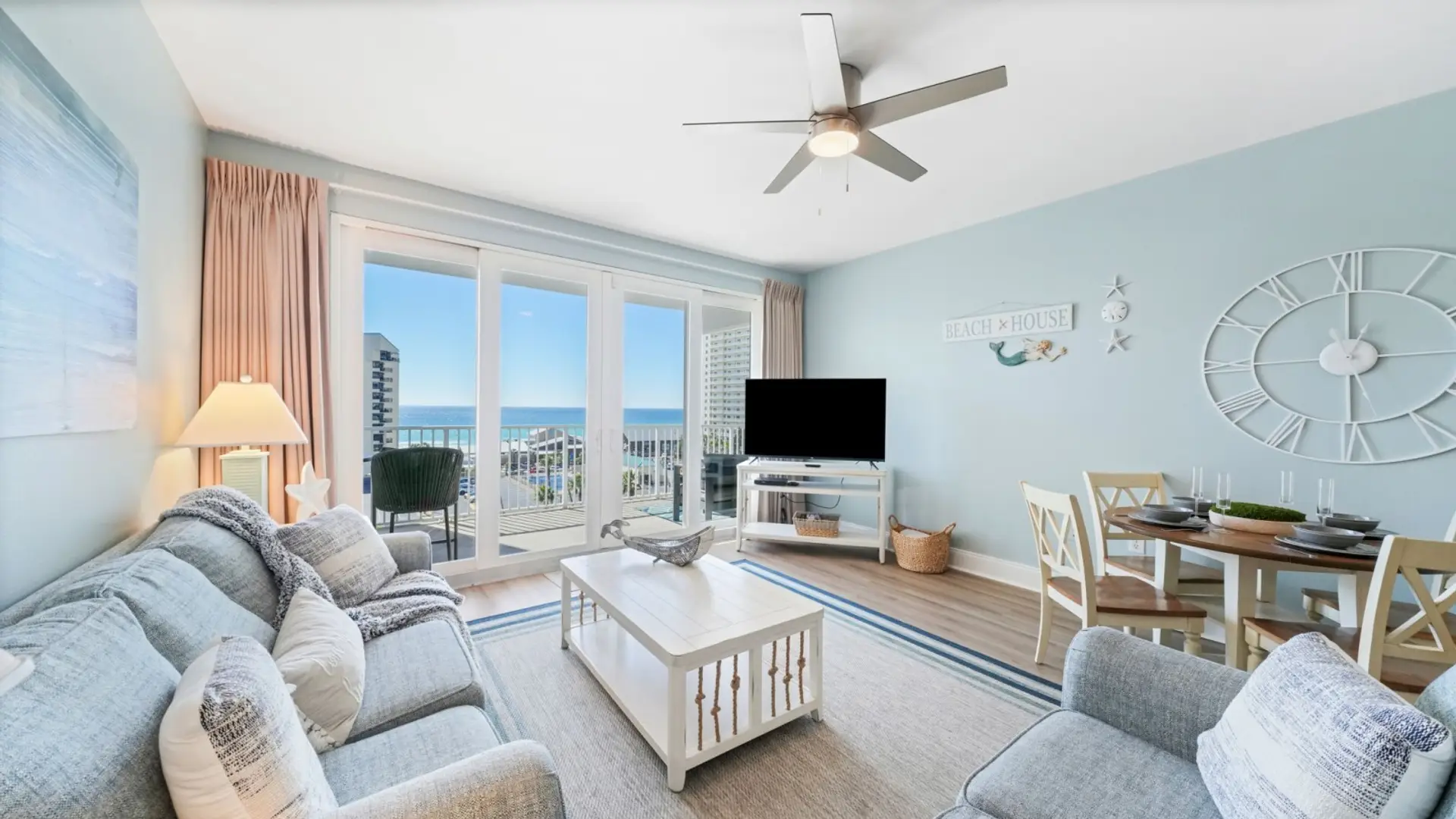 Open Concept Living Area with Ocean Views, Flat Screen TV, Sleeper Sofa and Dining Table