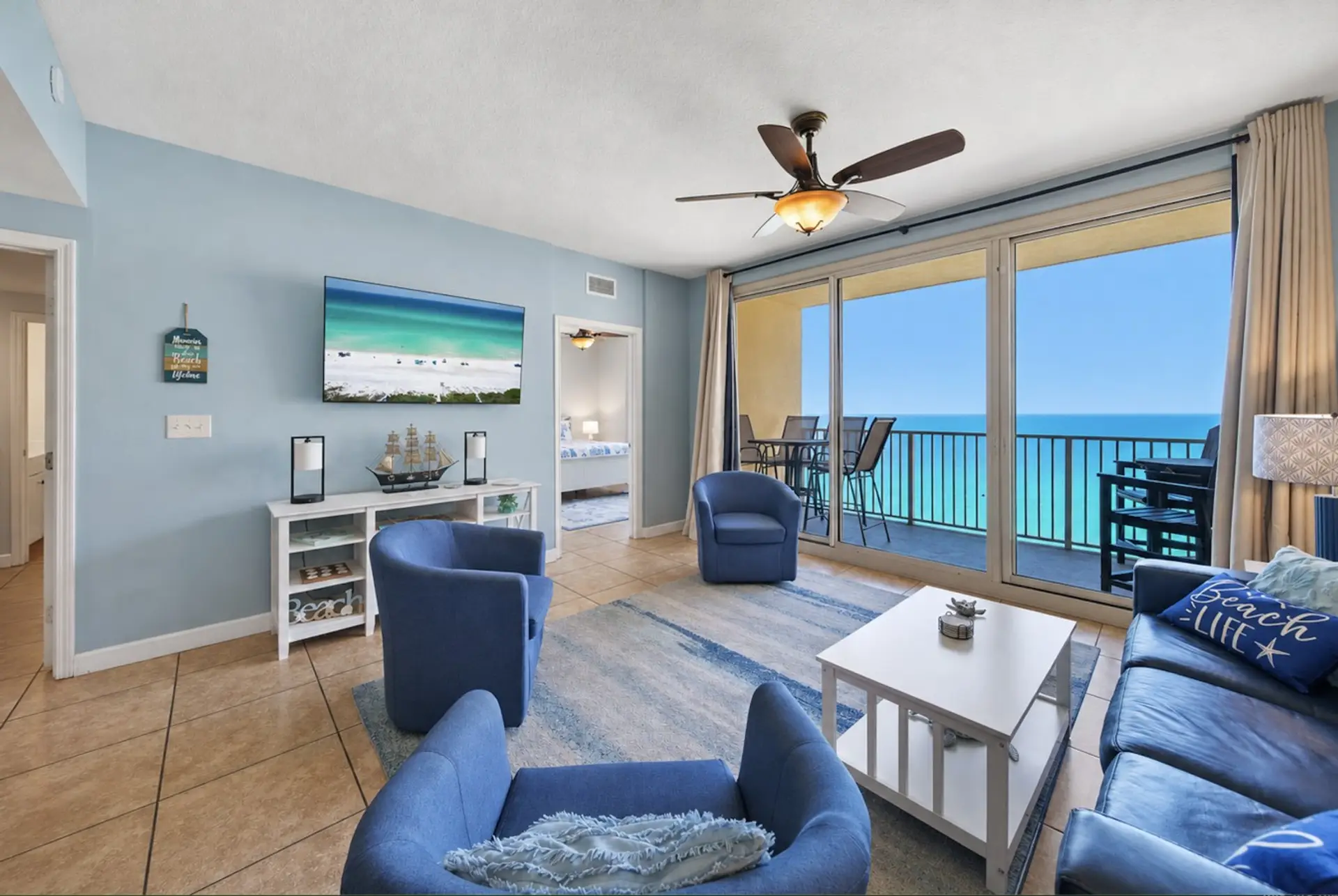Living Room with Private Balcony Access, Sleeper Sofa and Flat Screen TV