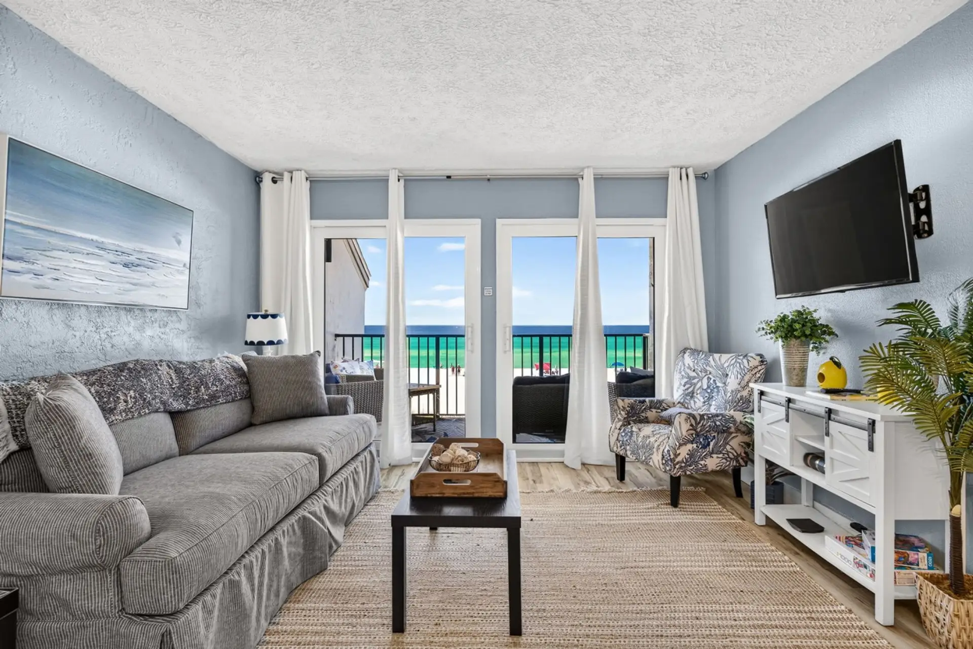 Ocean View Living Area with Queen Sofa Bed, Flat Screen TV, Endless Ocean Views and Private Balcony