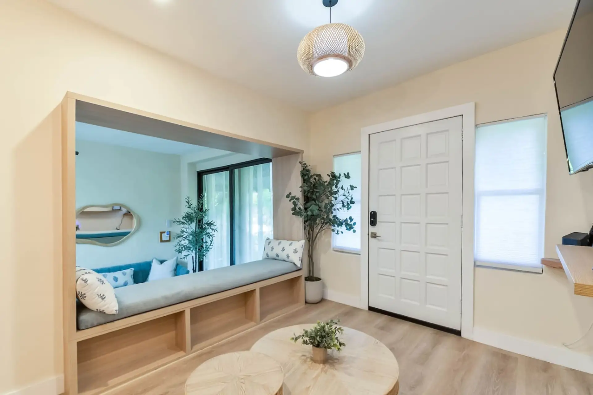 Spacious living room with Smart TV and cozy seating — unwind after exploring Miami.