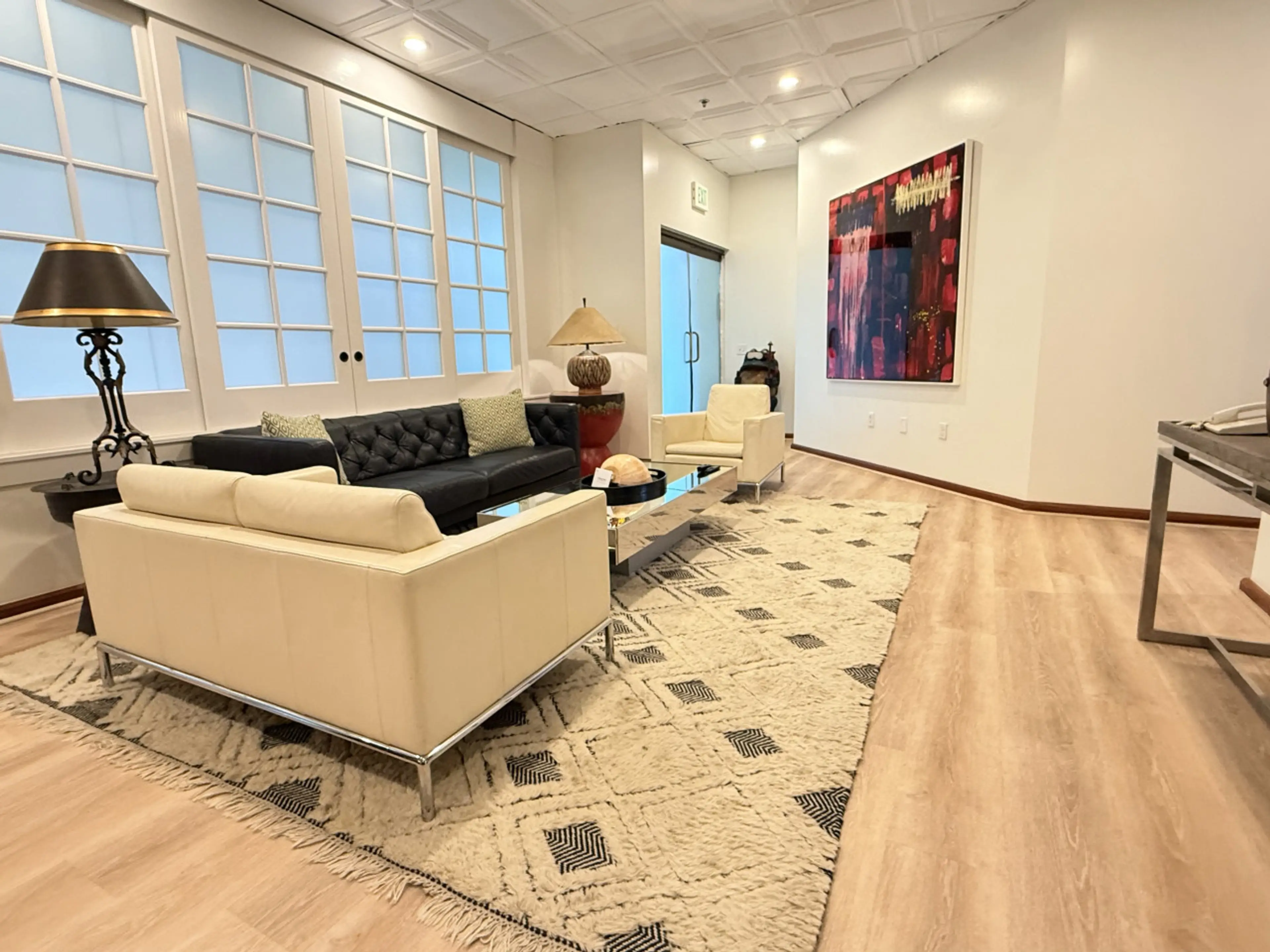 Expansive Living Room With Doors Leading to Dining Area