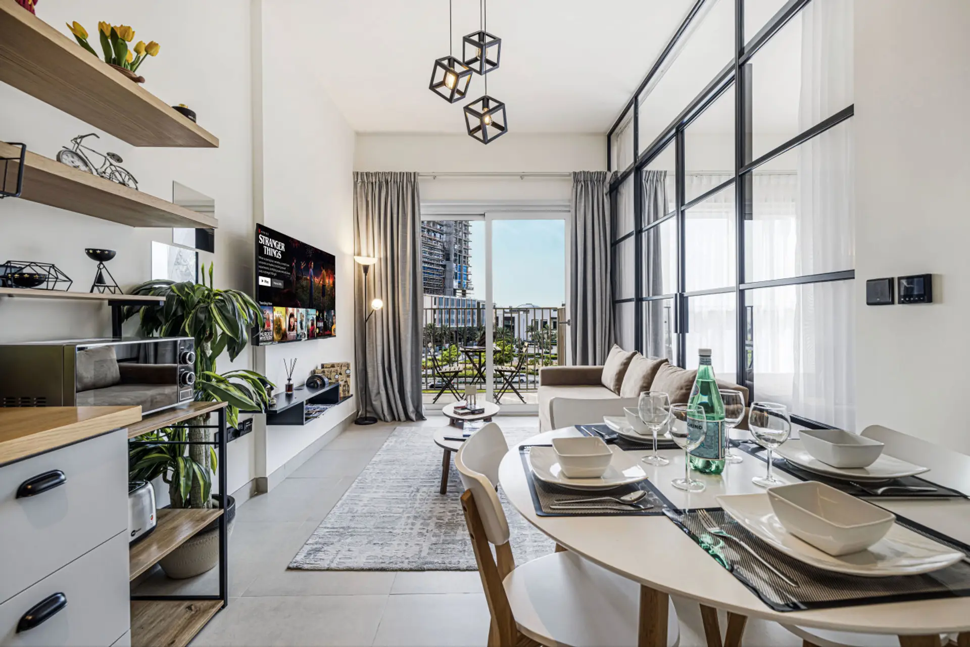 Living Room: Sun-soaked elegance with chic design, perfect for relaxation or movie nights!
