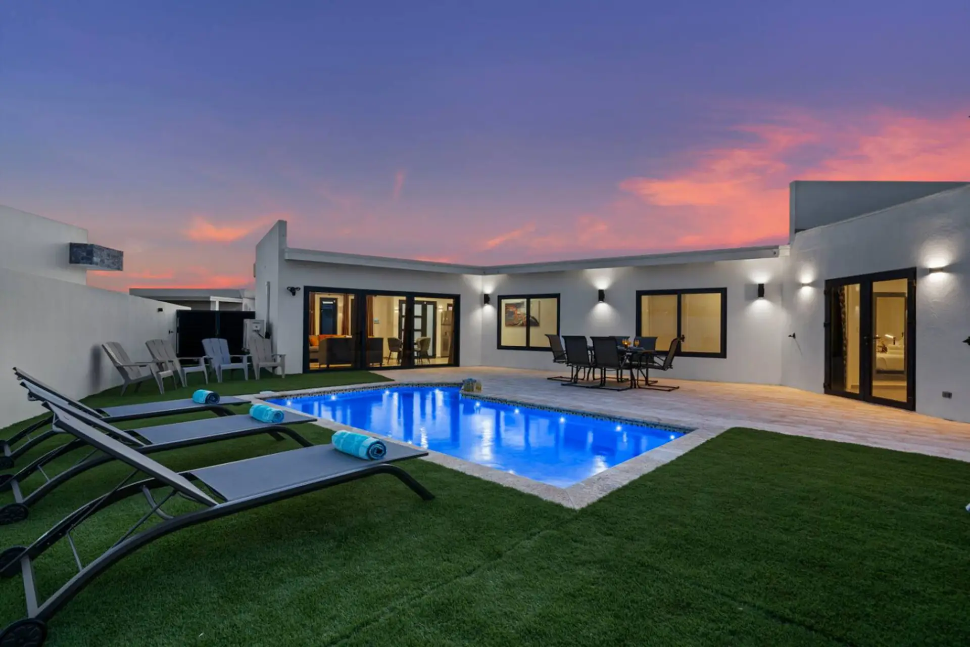 Swim under golden skies in a glowing infinity pool paradise.