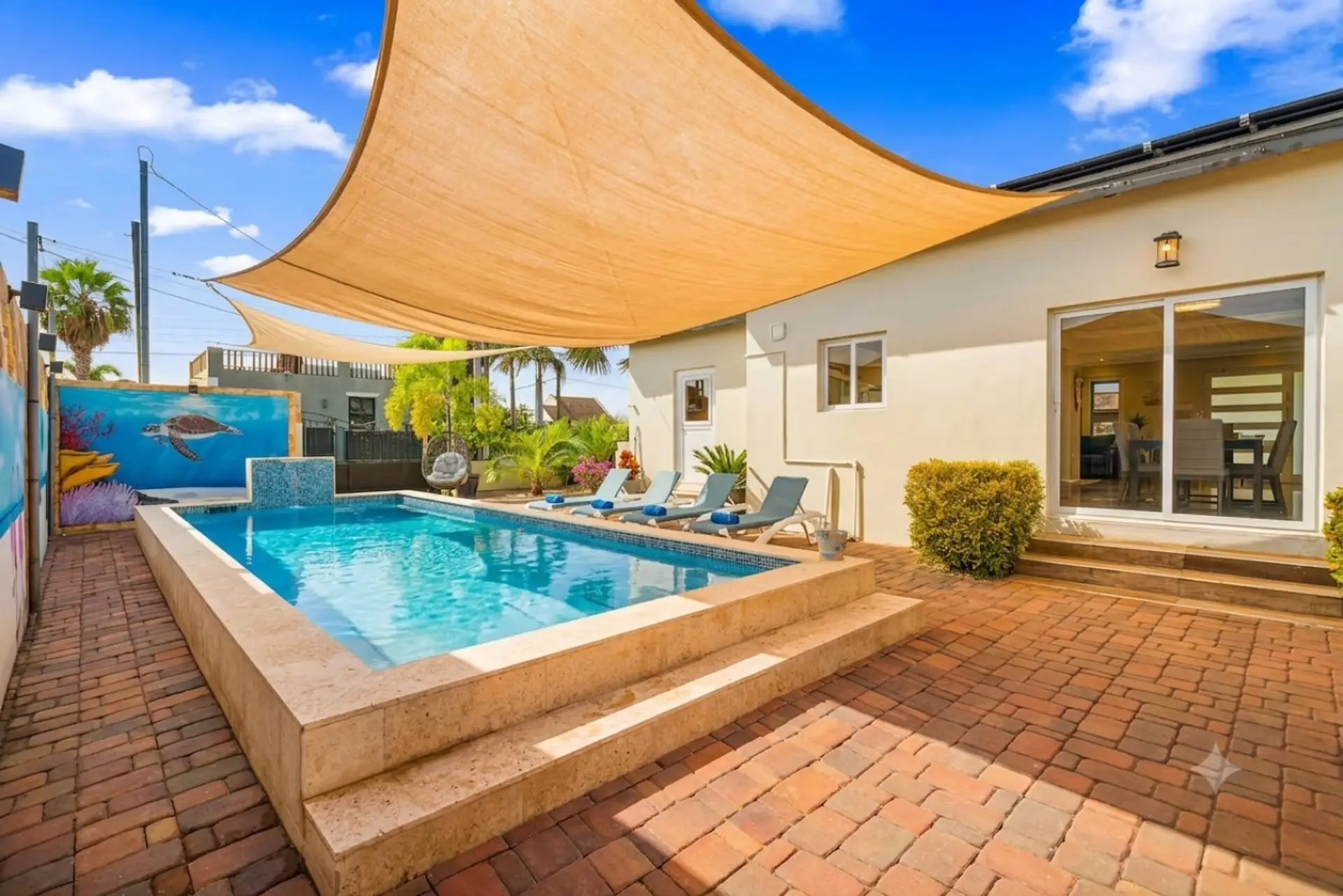 Modern tropical villa with a refreshing plunge pool, and vibrant mural art! Perfect for a relaxing getaway with friends or family