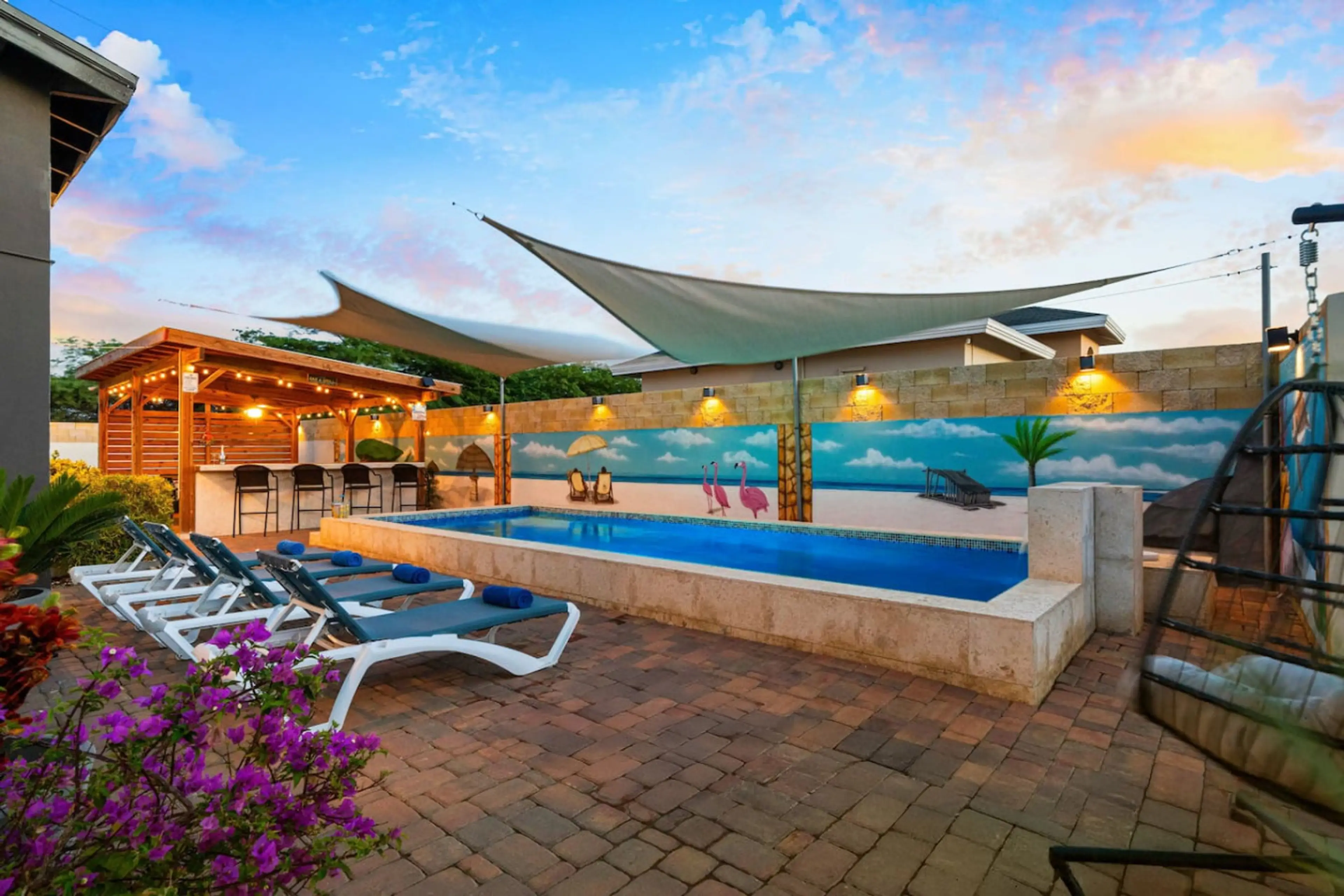 Private pool with loungers at our Aruba villa for laid back island days