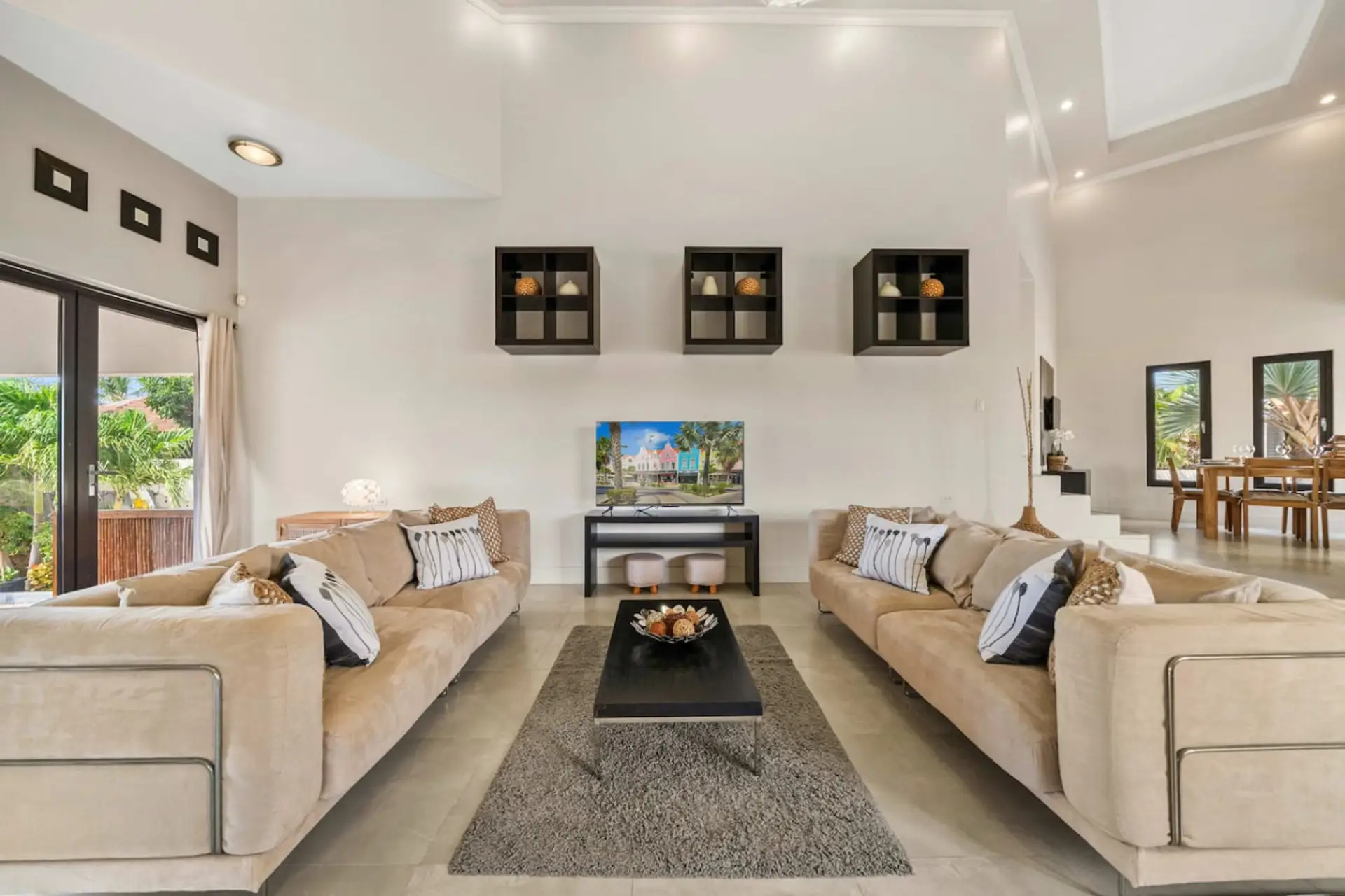 Settle into a bright living room with plush seating, airy comfort, and a welcoming layout perfect for relaxing after beach days and island adventures