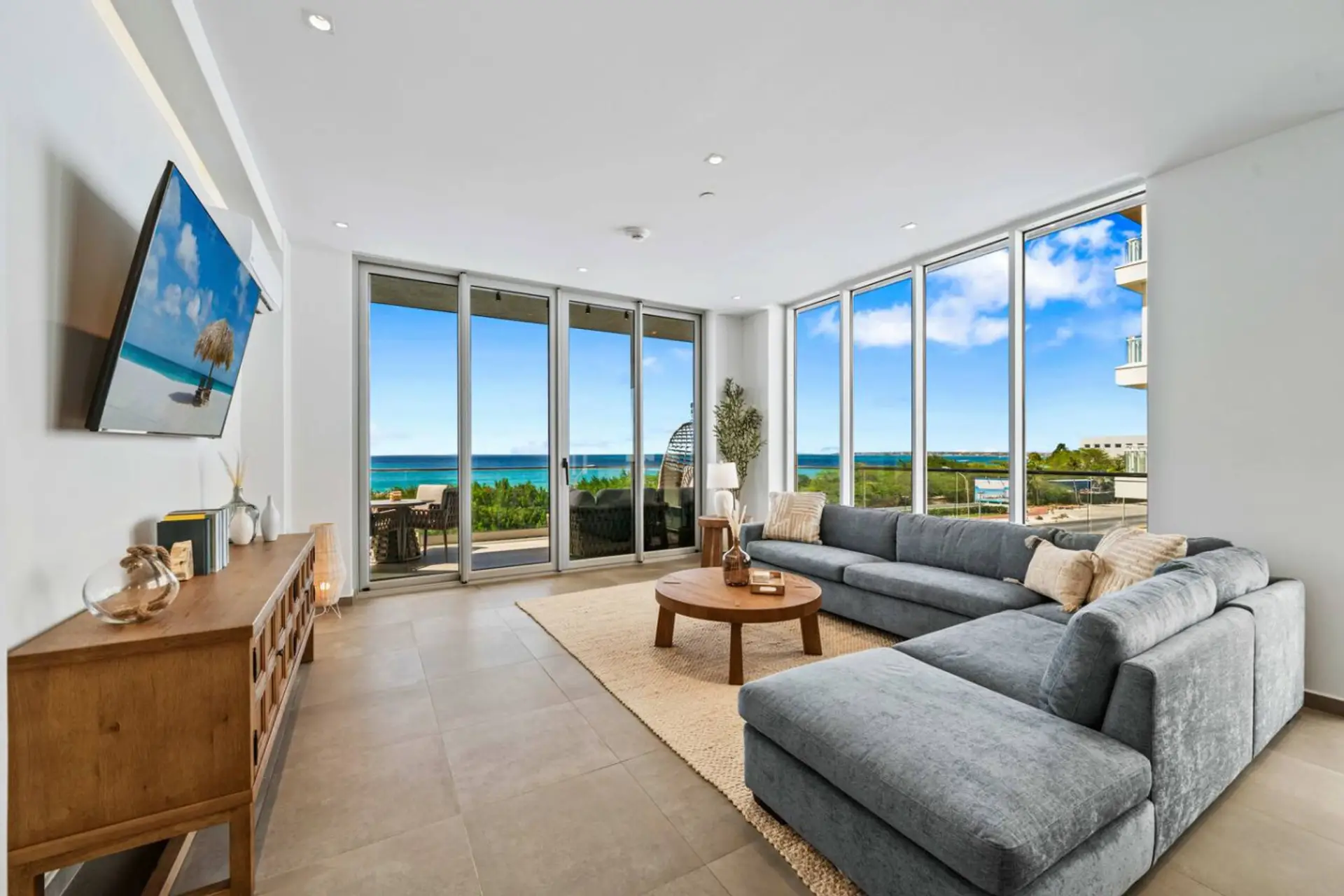 Aruba living room with ocean views and space to relax after beach days