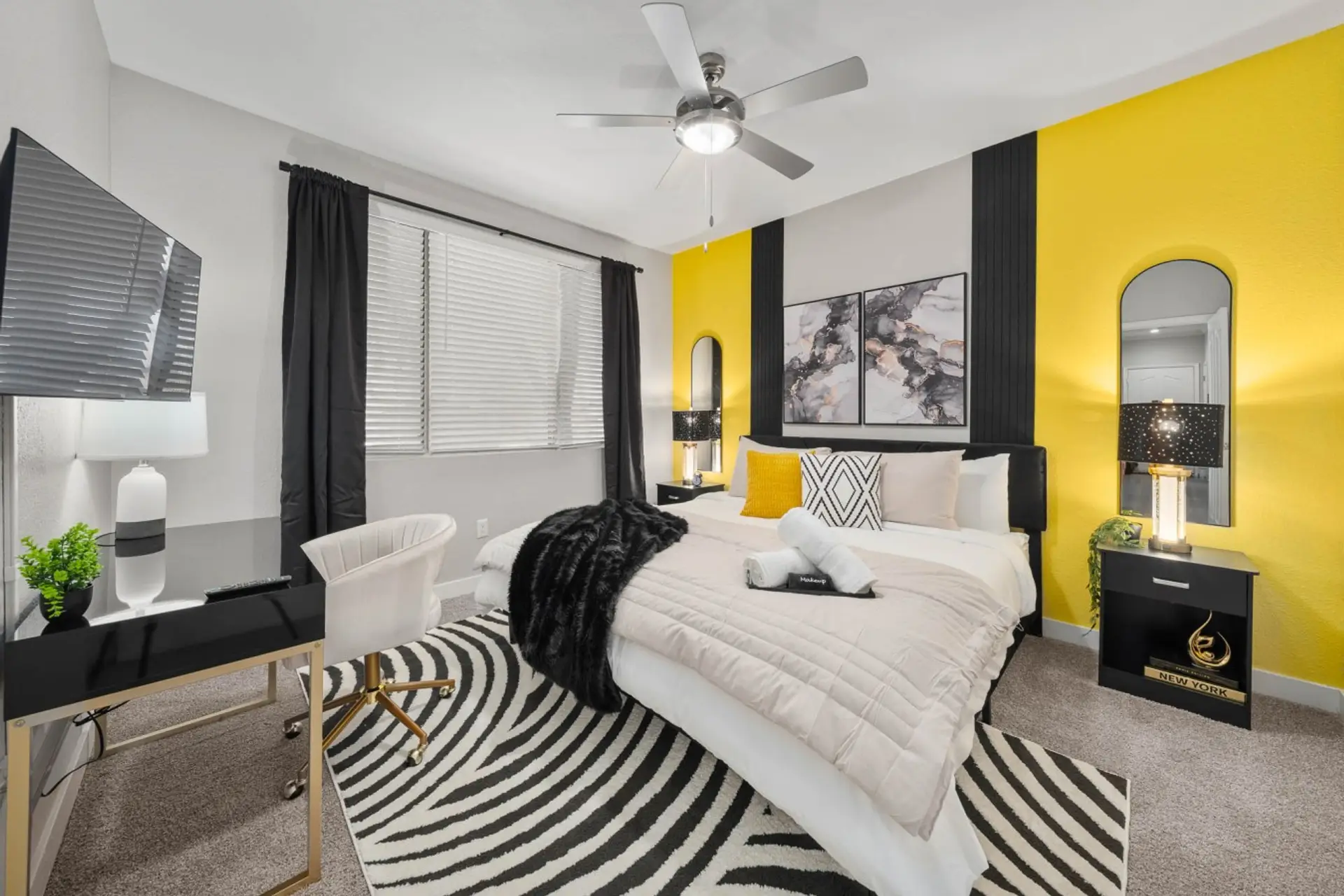 Spacious primary suite with a king bed and private ensuite bathroom.