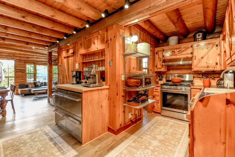 Well-equipped log cabin kitchen