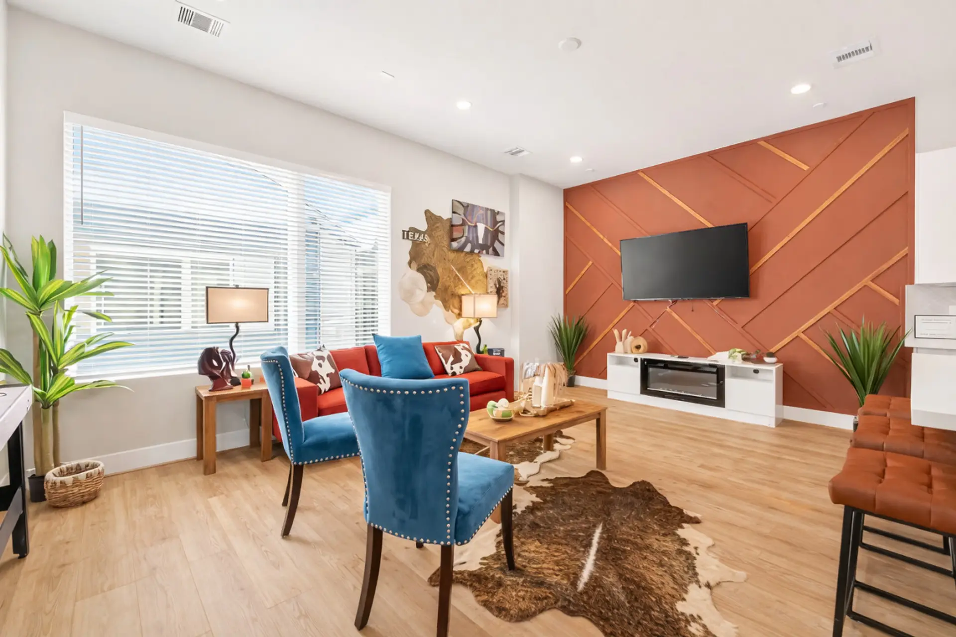 Living Room: Bright and modern space with vibrant decor, perfect for unwinding and entertaining!