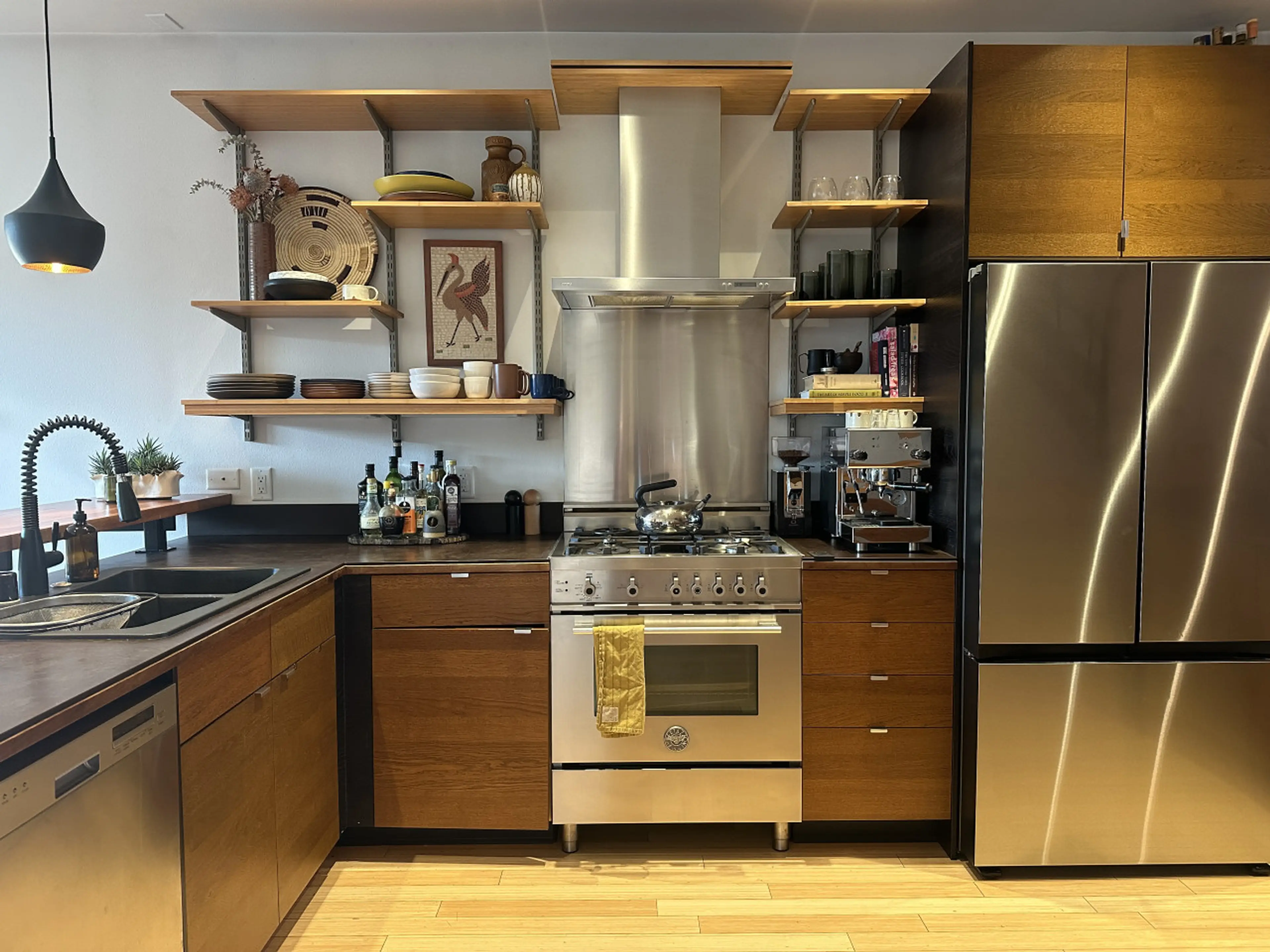 Chef's kitchen featuring high-end appliances and cookware