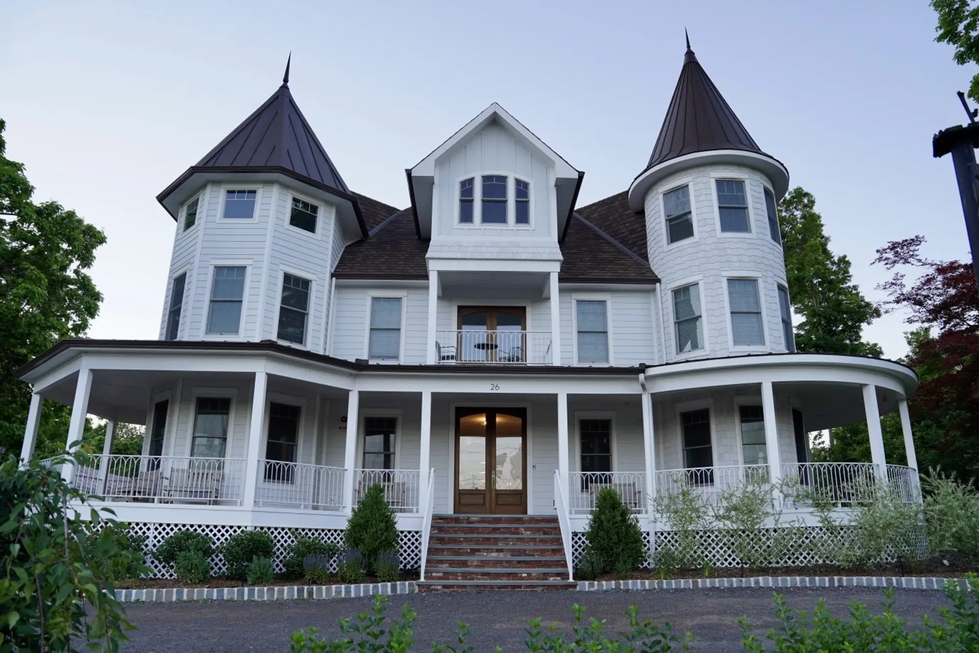 Welcome to Parkway House Goshen, a turn of the century Victorian with twin turrets, a sweeping wraparound porch, and brick steps leading to the front door. Rocking chairs and porch seating invite you to slow down and stay awhile.