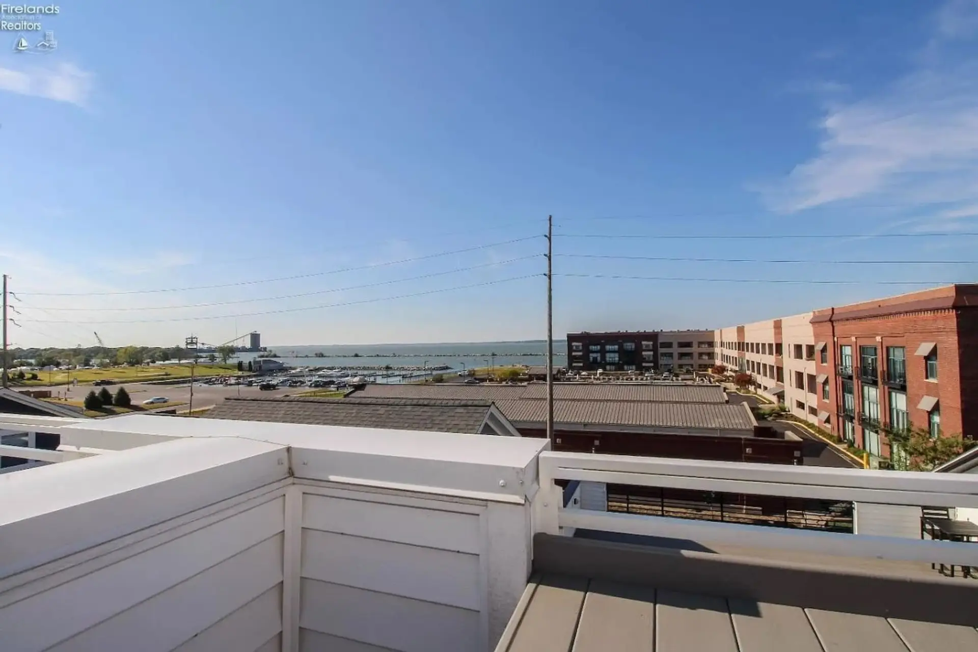 Take in sweeping views of Sandusky Bay and the marina from your private rooftop deck.