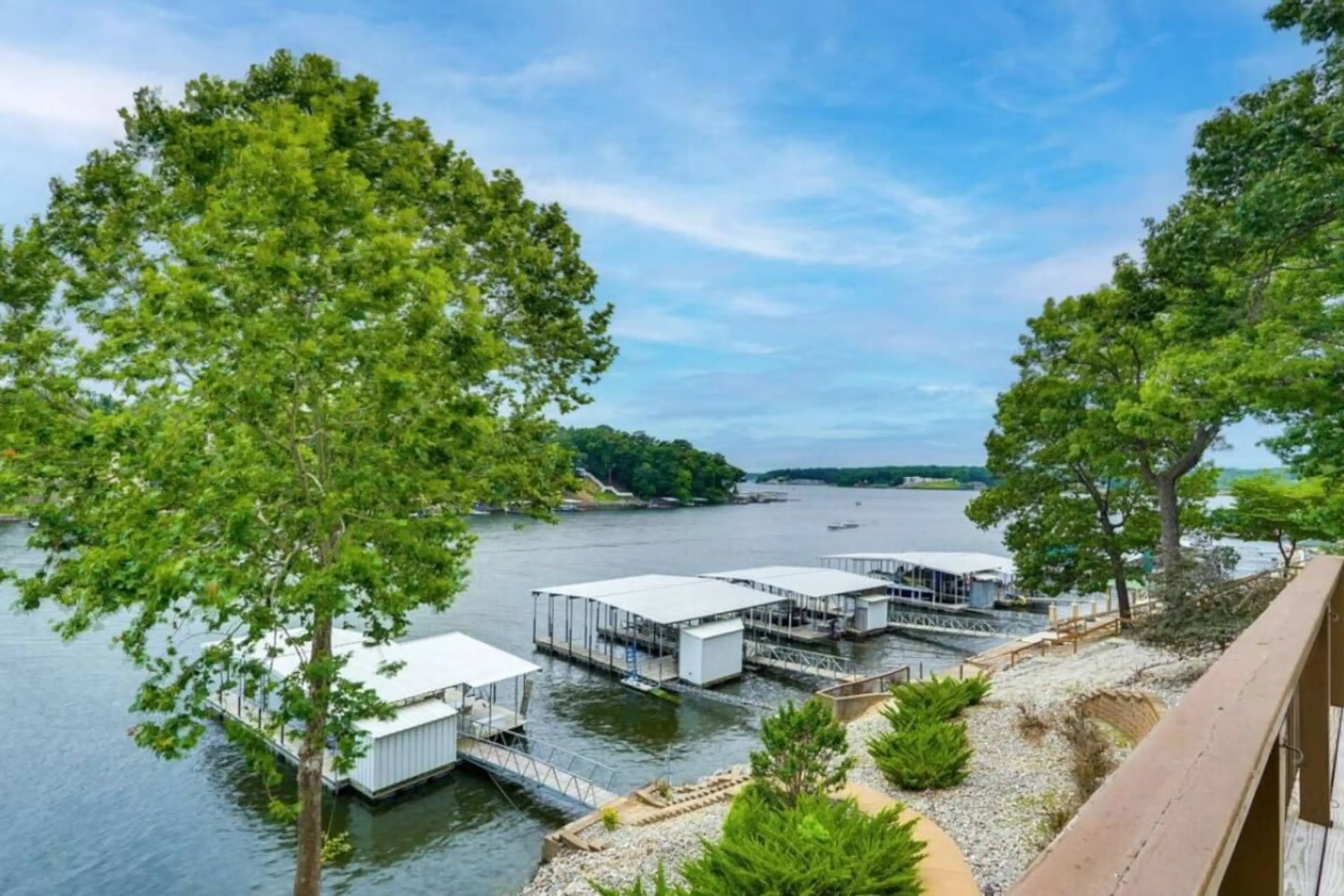 Expansive Balcony Overlooking the Lake - Perfect for morning coffee or evening relaxation.