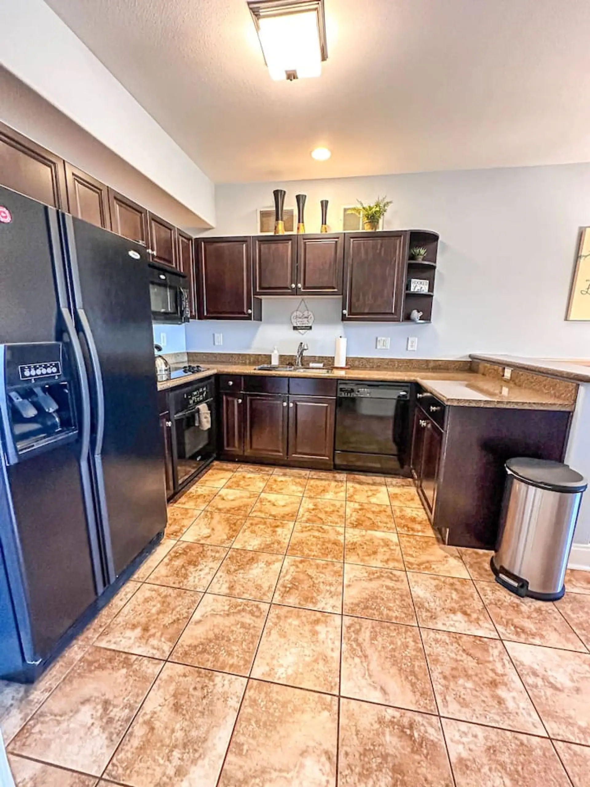 A fully stocked kitchen with modern appliances, perfect for cooking a homemade meal or prepping your favorite snacks.