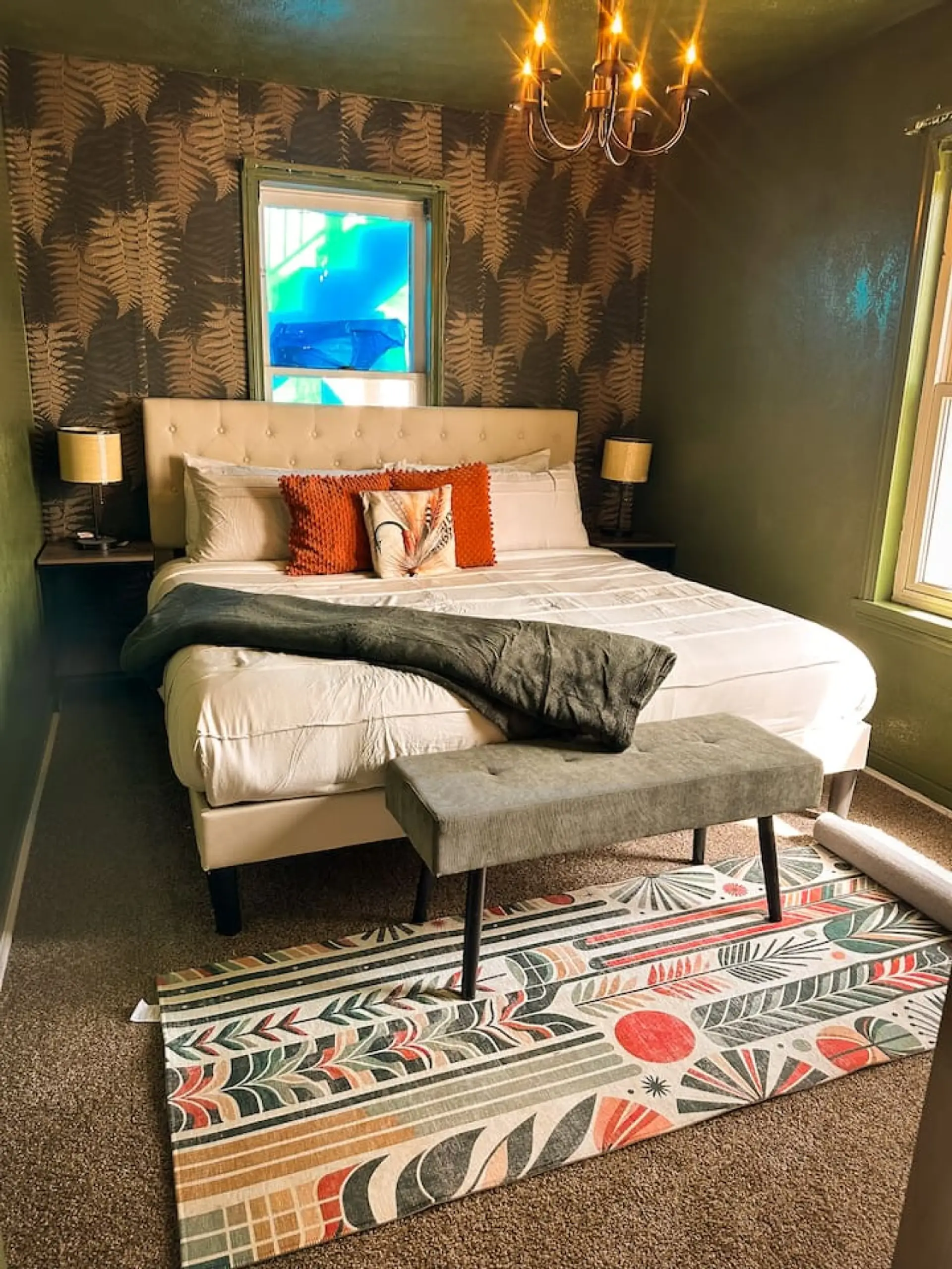 Cozy stylish bedroom with plush king bed