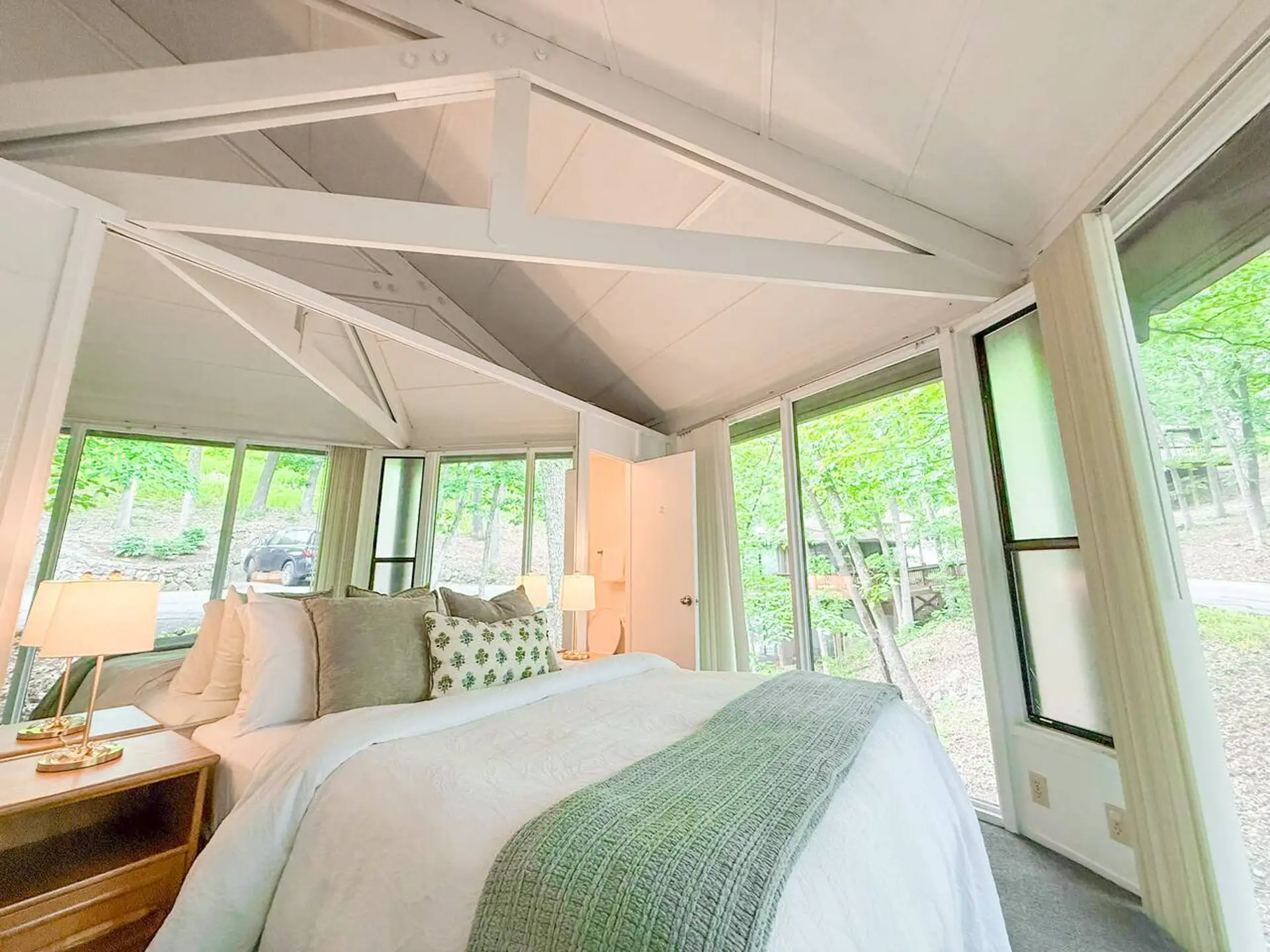 Sun-drenched mornings and lush green views. The Branch Bungalow combines modern comfort with nature's beauty, creating a bright and airy oasis.