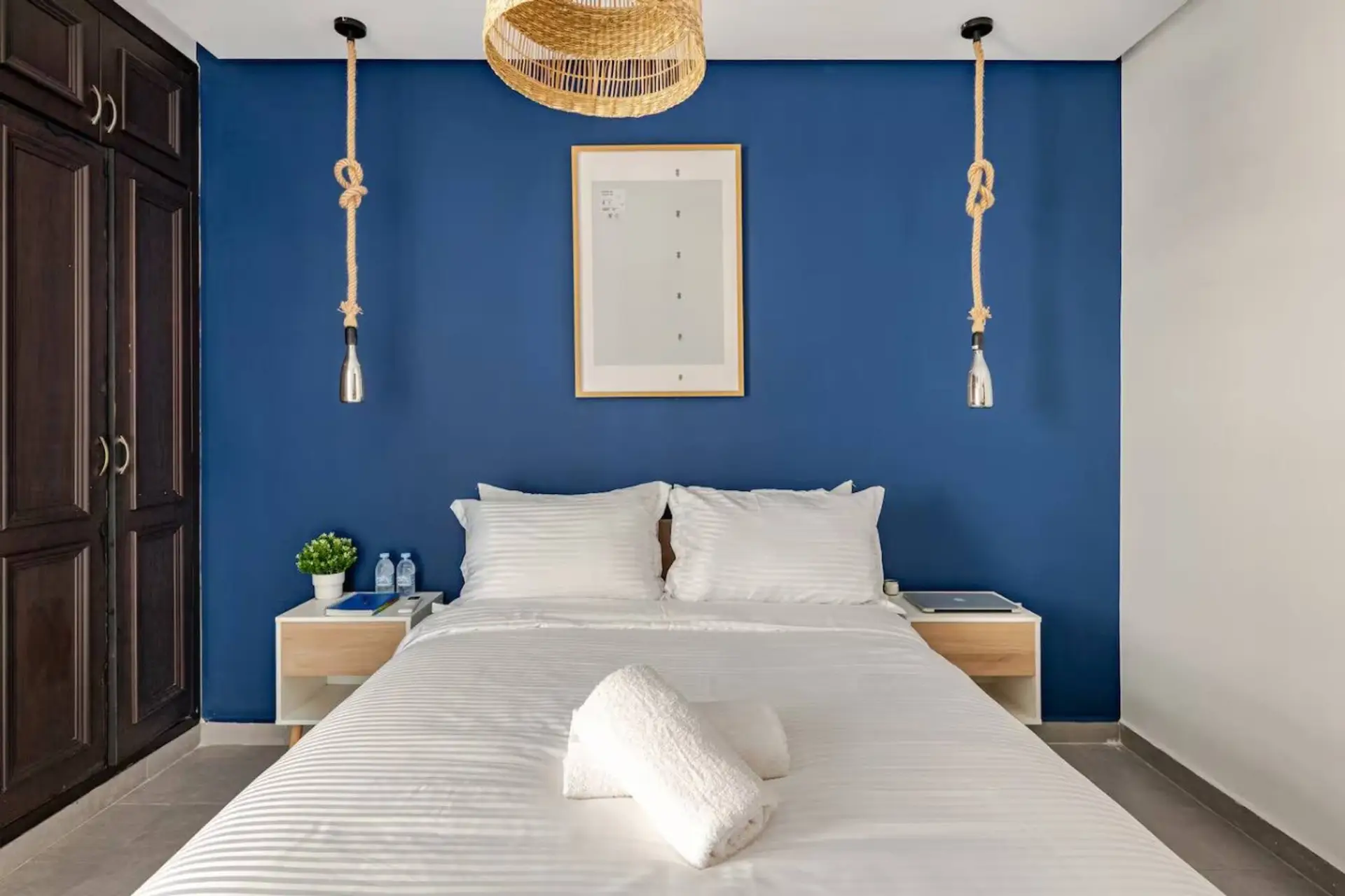 Elegant bedroom with double bed and modern decor