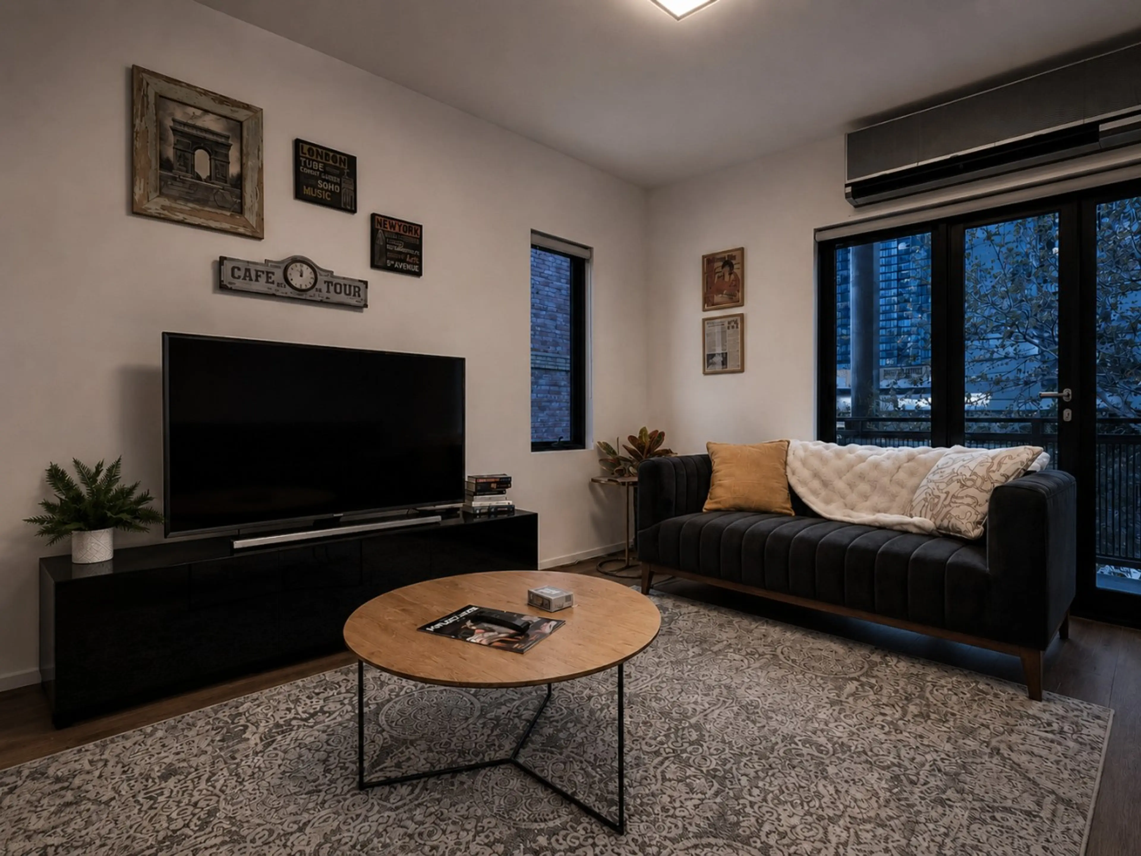 The living room has a smart HD TV, decorous reading material, and plush sofas, including a fold-out sofa bed (advance notice is required if you would like to have the sofa bed made up for your stay).