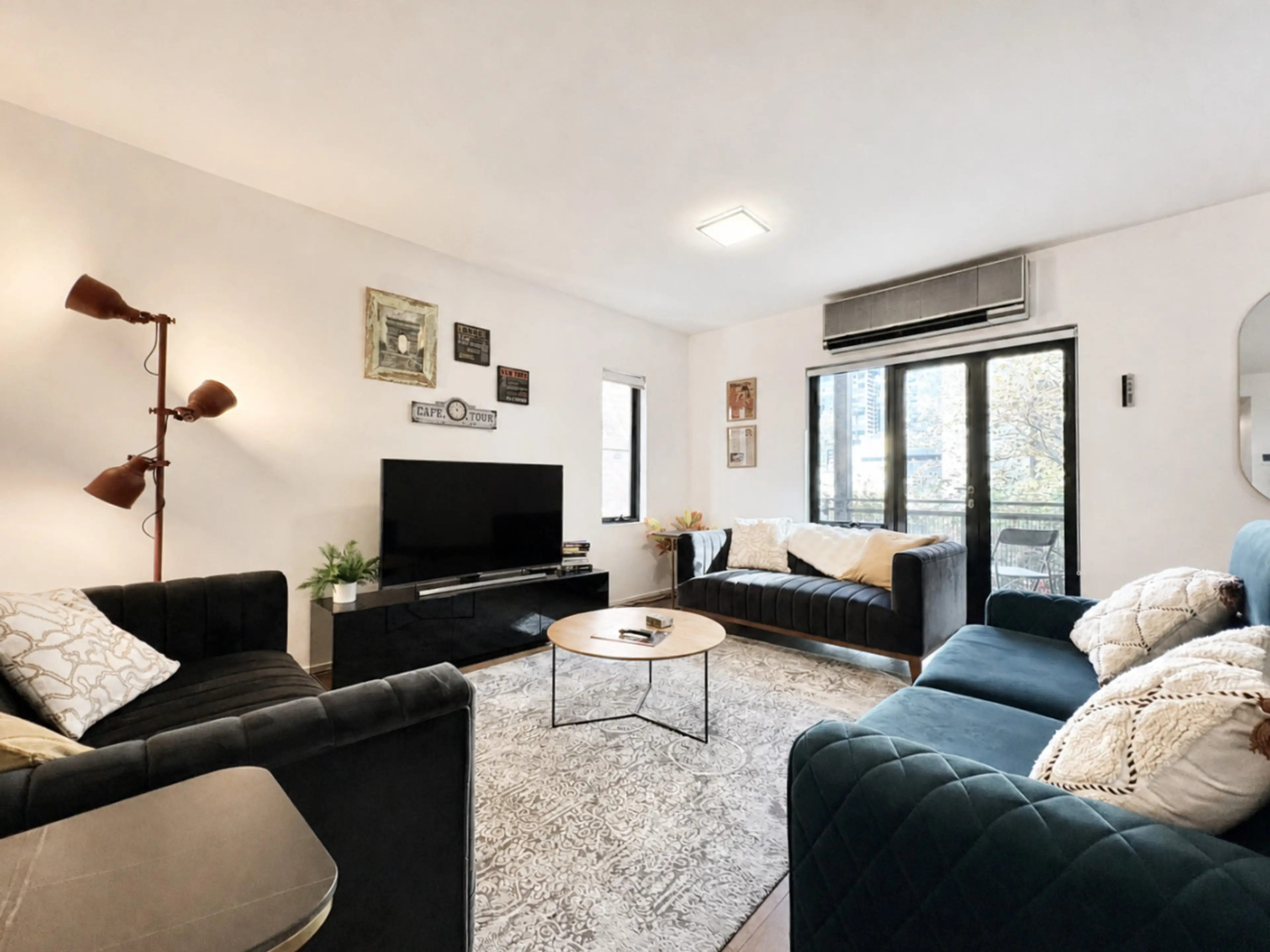 The living room has a smart HD TV, decorous reading material, and plush sofas, including a fold-out sofa bed (advance notice is required if you would like to have the sofa bed made up for your stay).