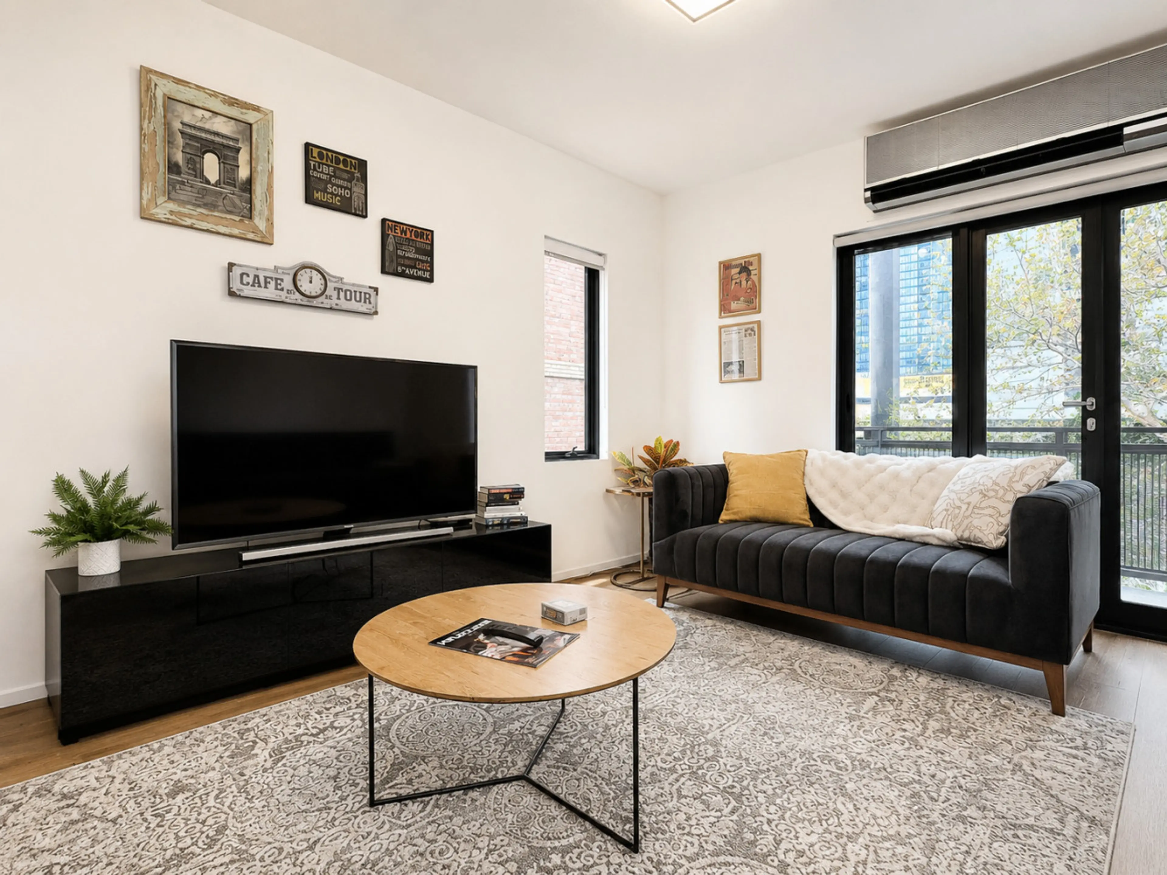 The living room has a smart HD TV, decorous reading material, and plush sofas, including a fold-out sofa bed (advance notice is required if you would like to have the sofa bed made up for your stay).