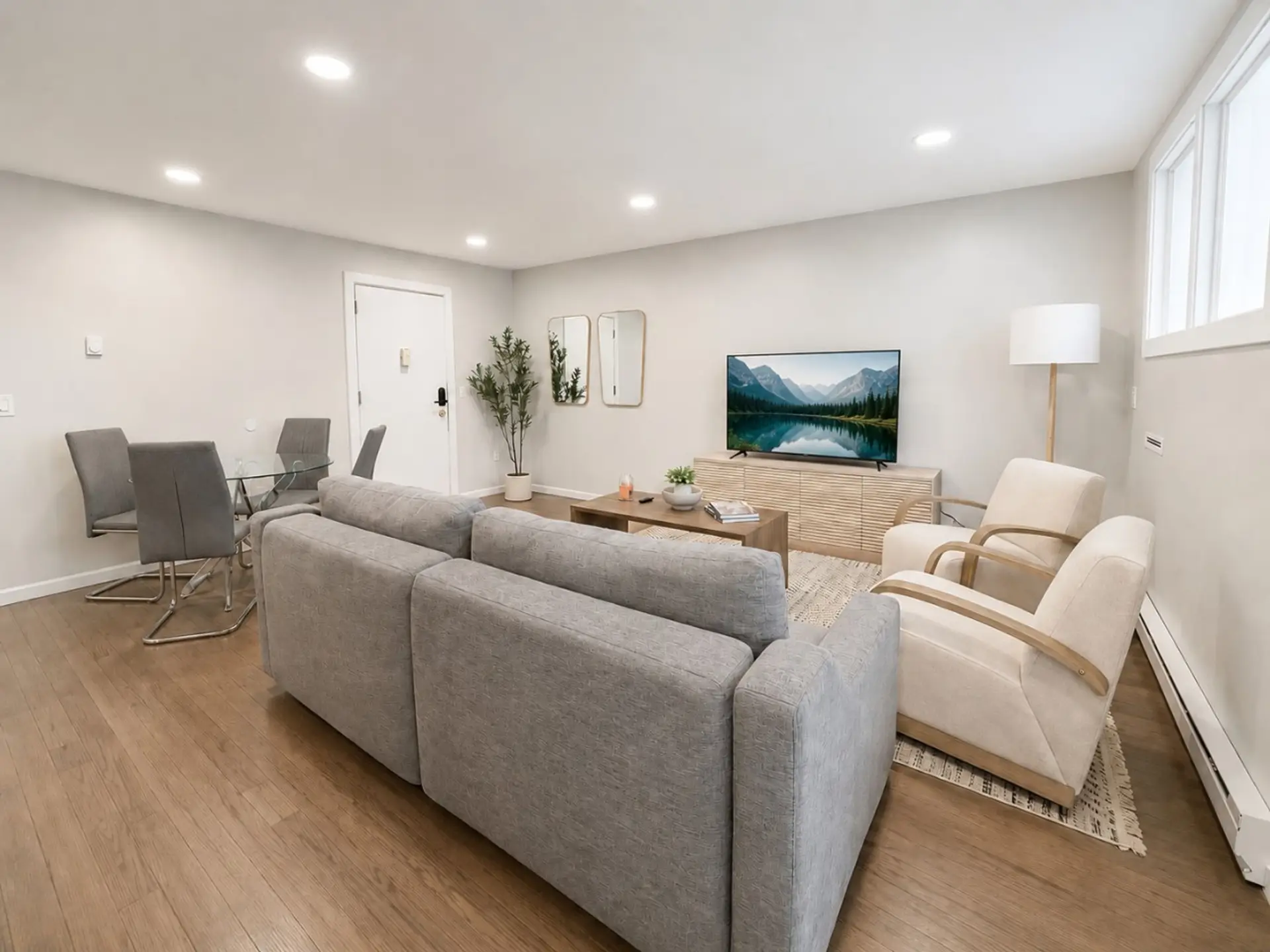 Open-concept living and dining area with comfortable seating.
