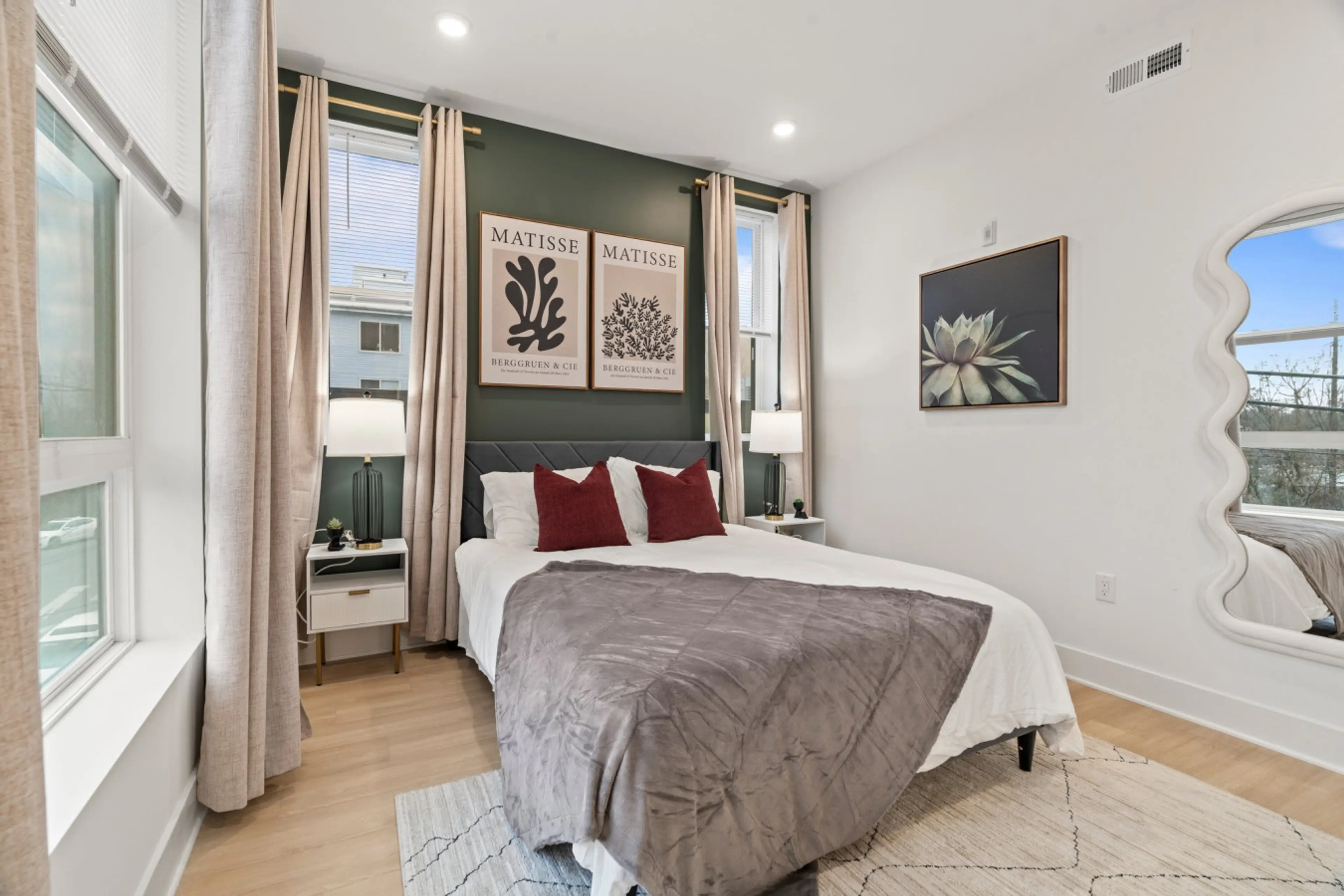 A peaceful retreat featuring a queen-sized plush mattress and blackout curtains for a restful night's sleep near downtown.