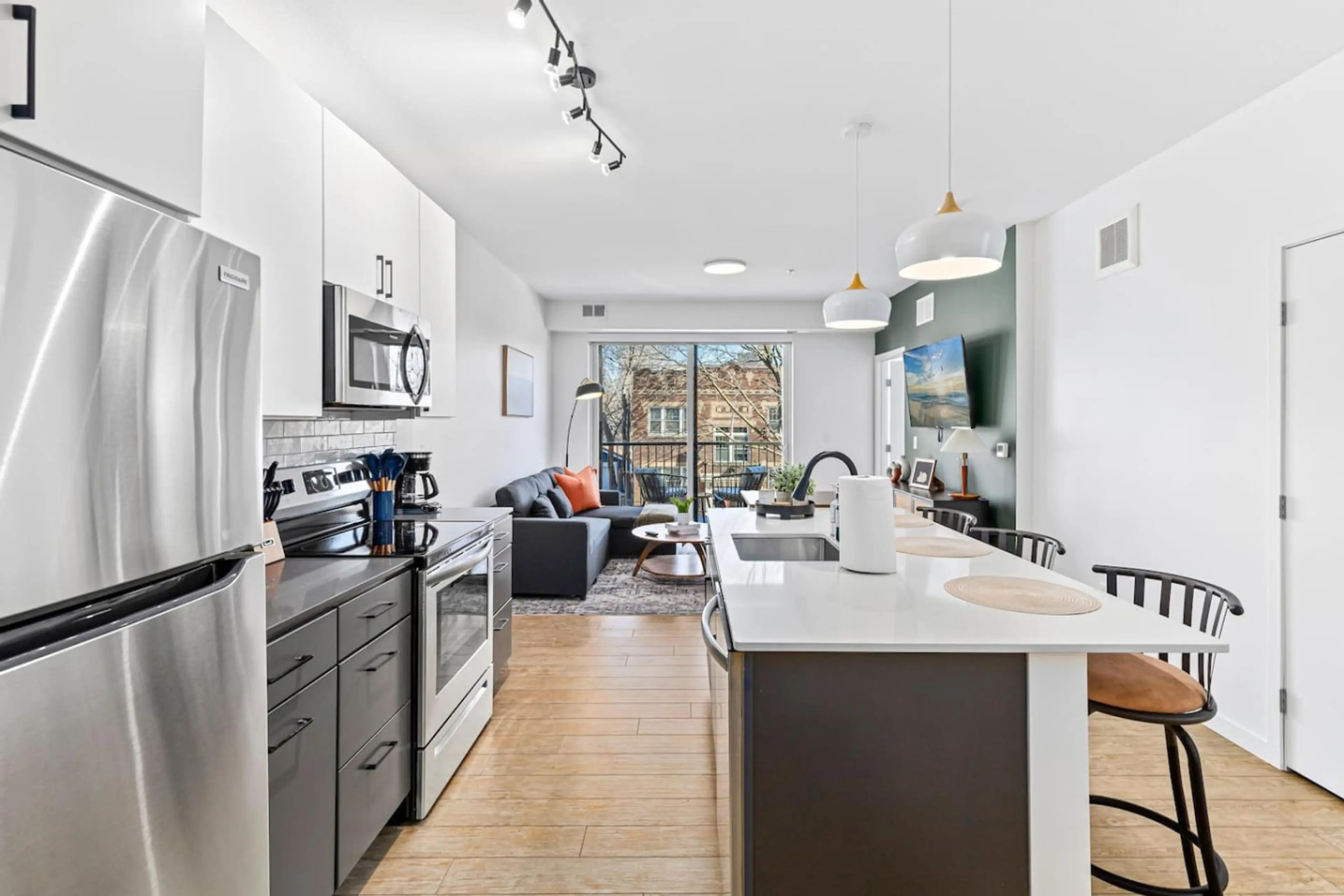 Gourmet Kitchen: Sleek appliances and vibrant decor await your culinary adventures!
