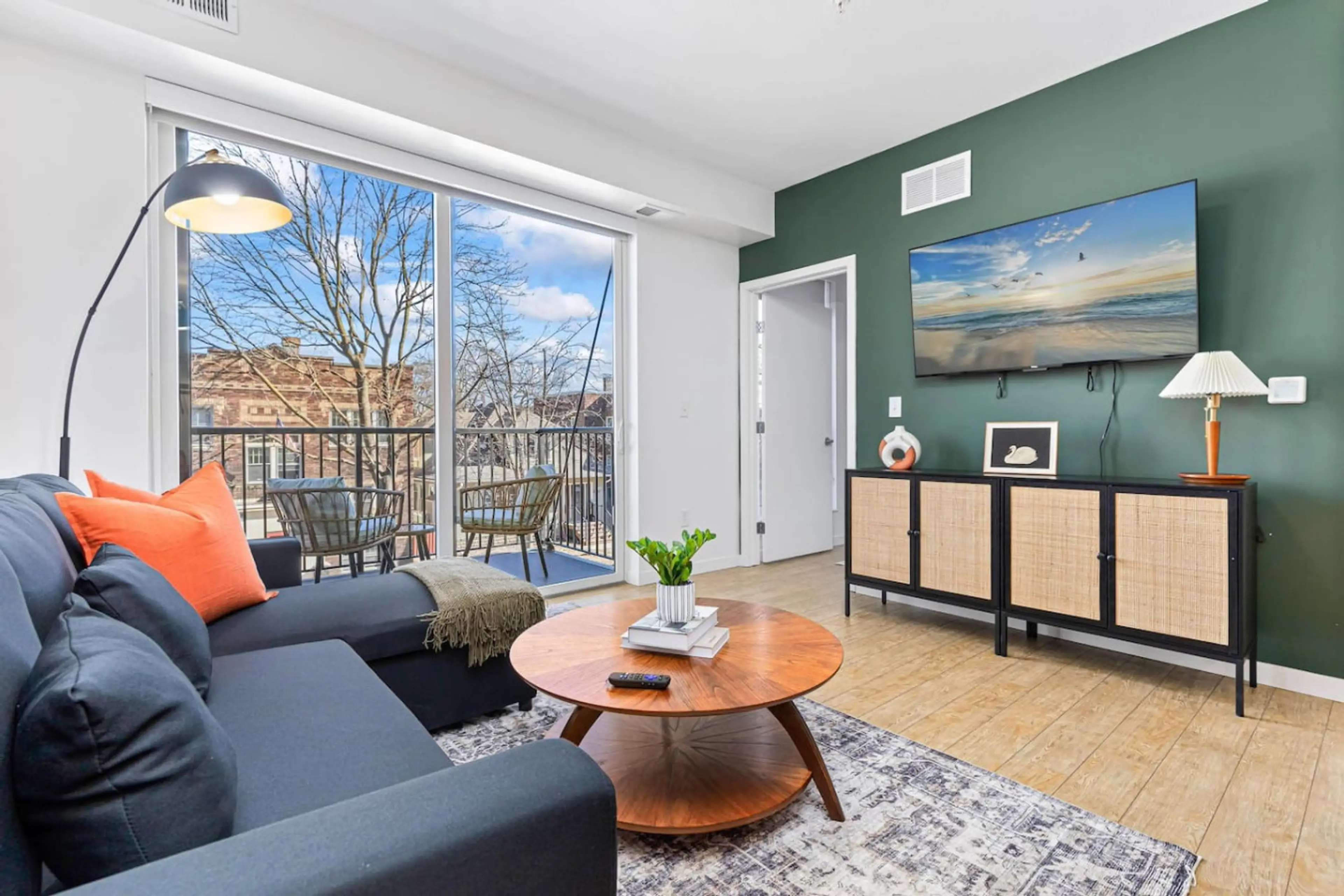 Living Room: Stylish retreat with sleek decor, balcony views, and a smart TV for entertainment!