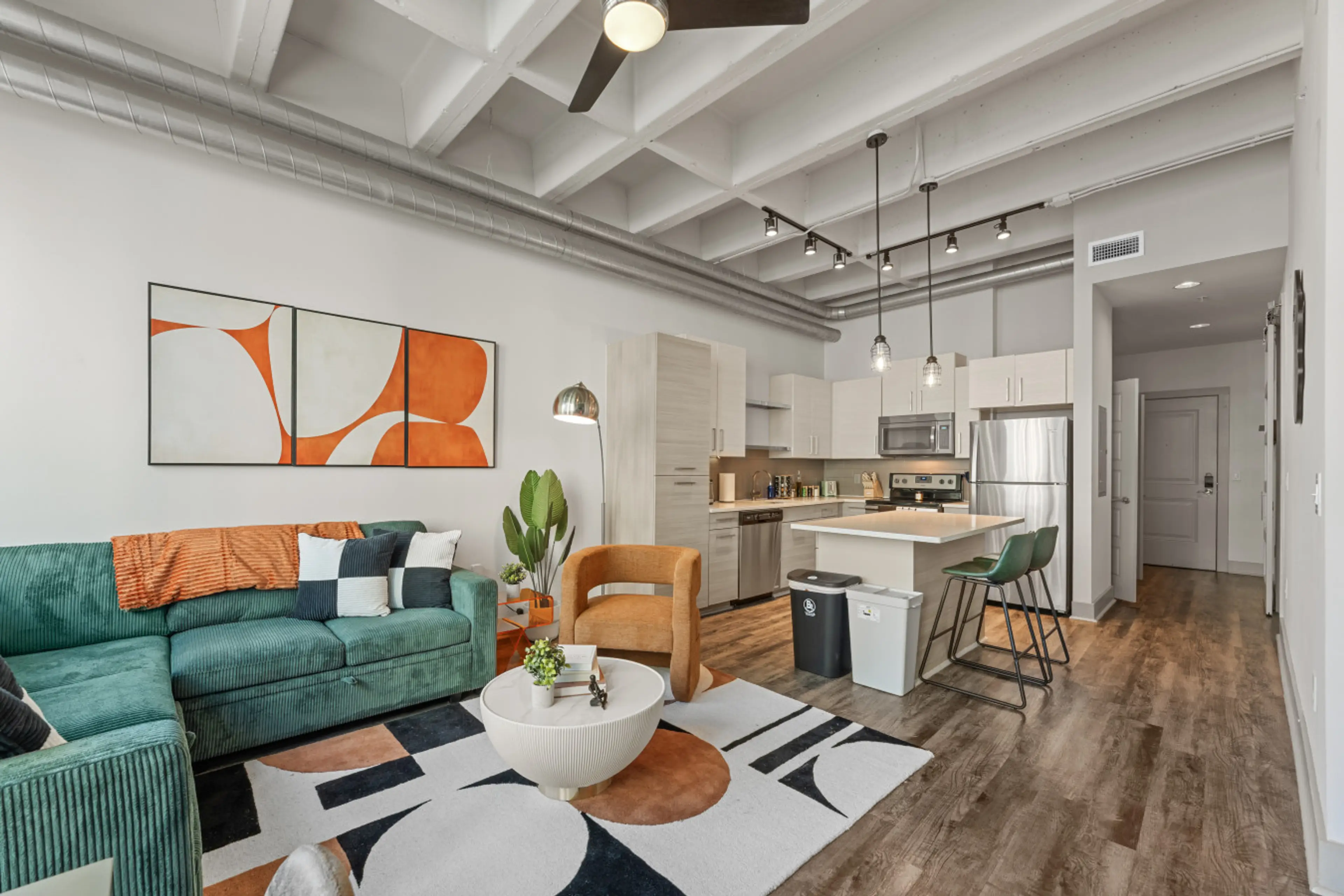Vibrant decor and inviting space with sleek kitchen views—your Atlanta adventure starts here!