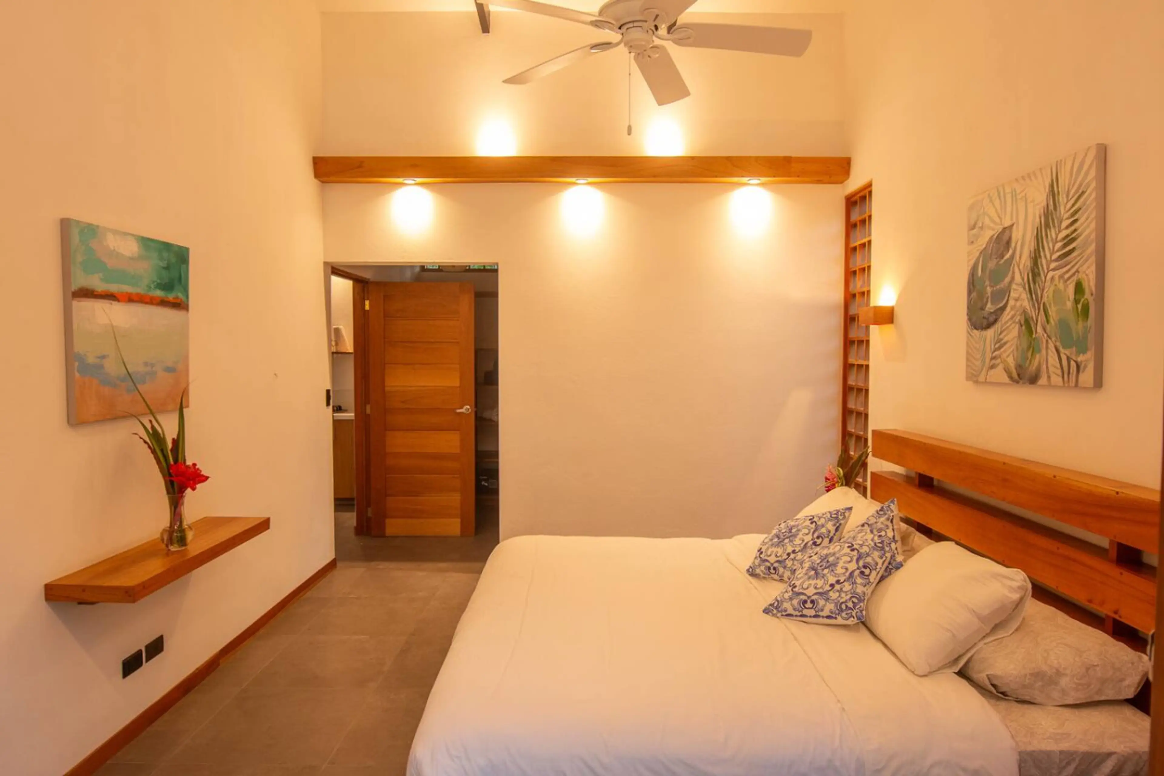 Spacious master bedroom with king bed and private bathroom, Tres Lodge Villa in Playa Chiquita, Costa Rica