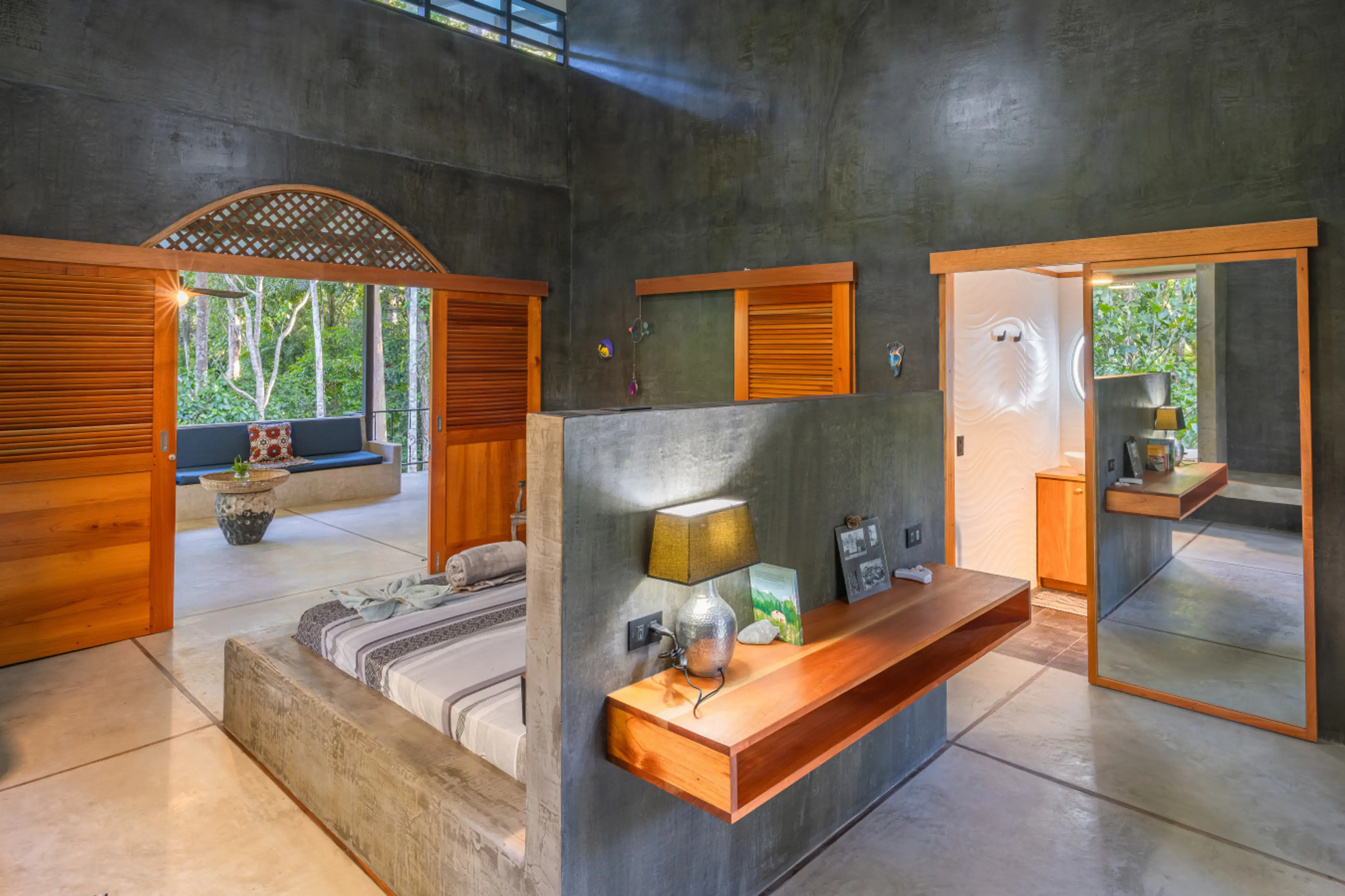 Spacious bedroom with indoor-outdoor living style at Tapa Dulce in Cocles, Costa Rica