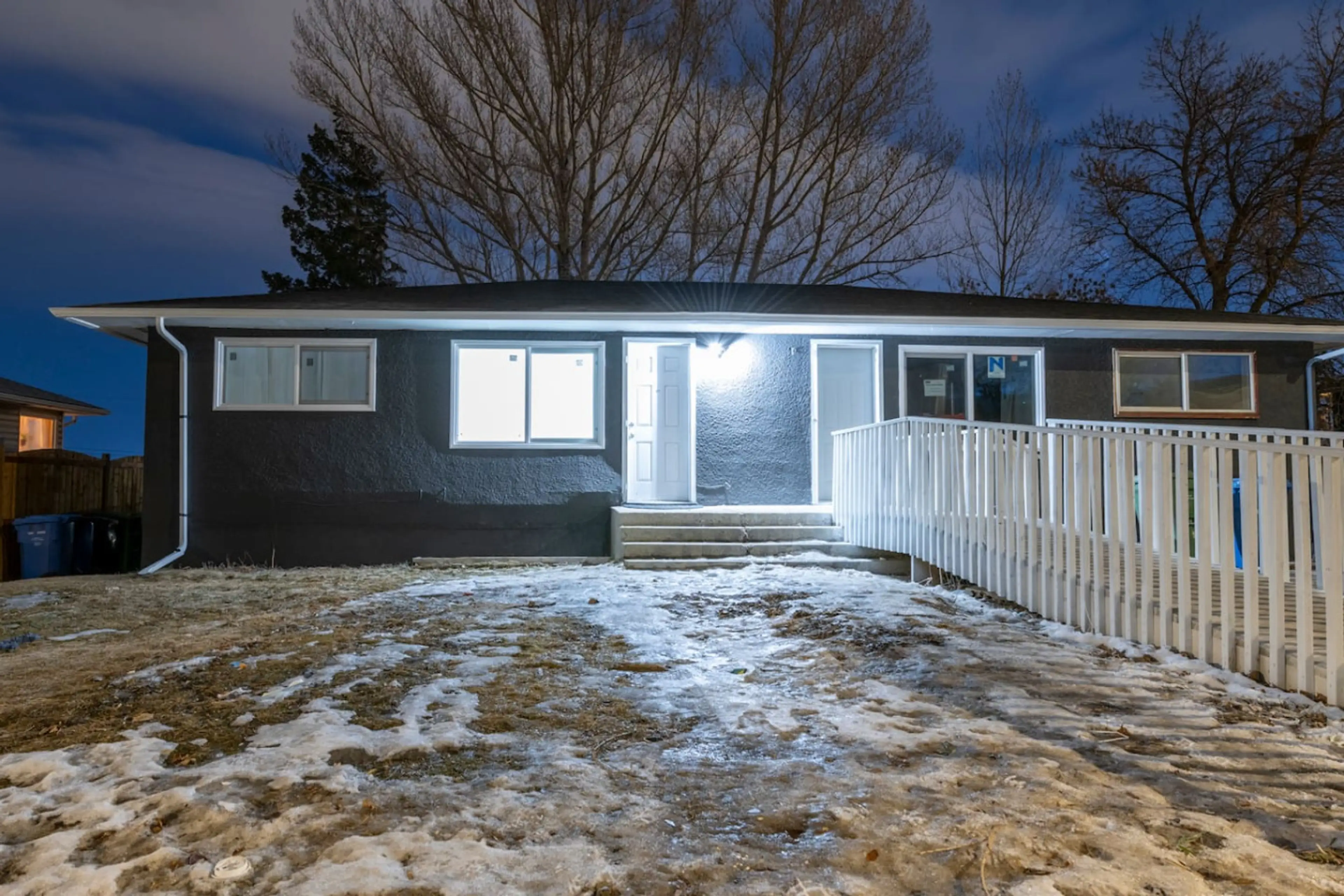 Private entrance beautifully lit at night for easy access.