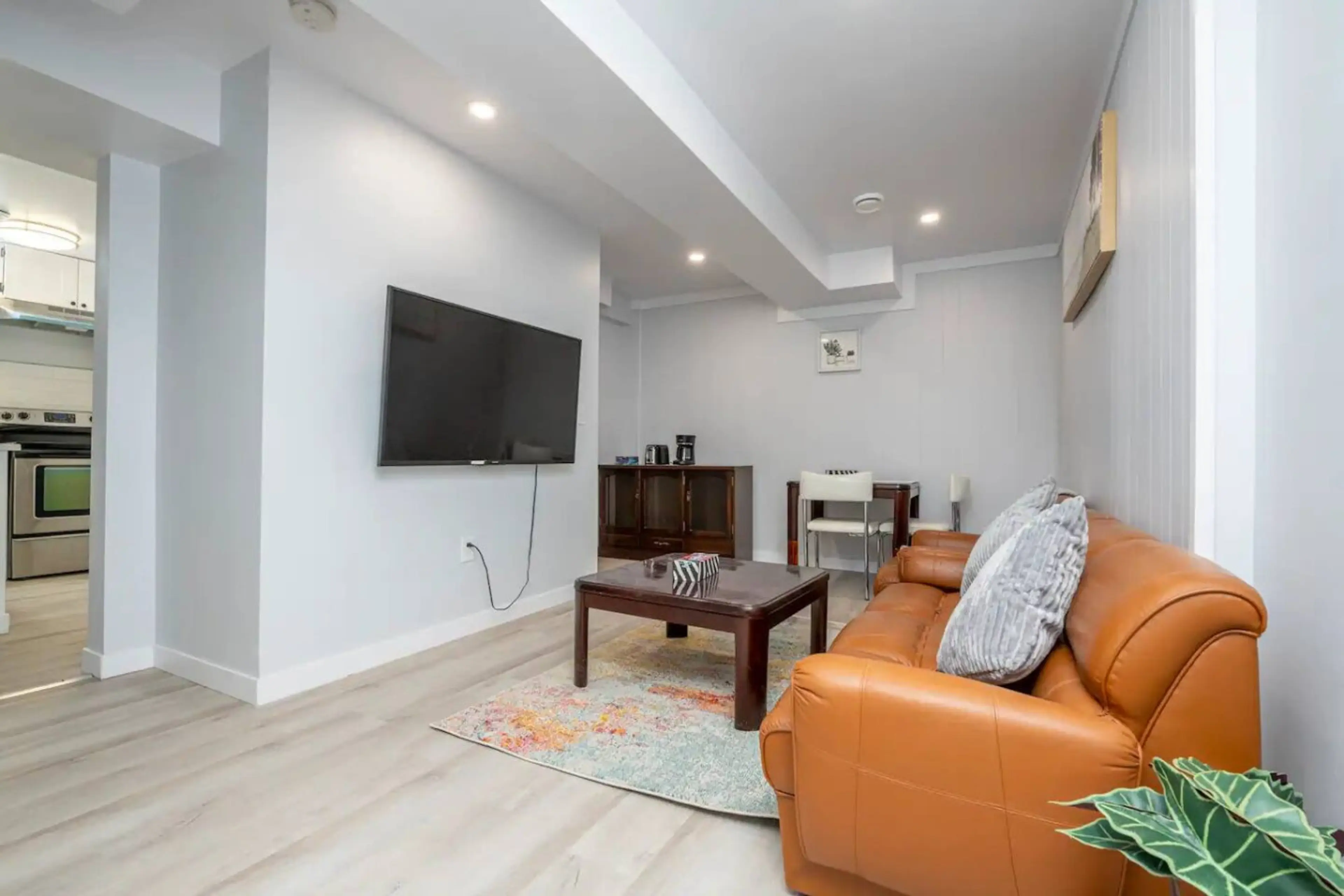 Cozy living area with smart TV and comfortable seating, perfect for relaxing after a long day