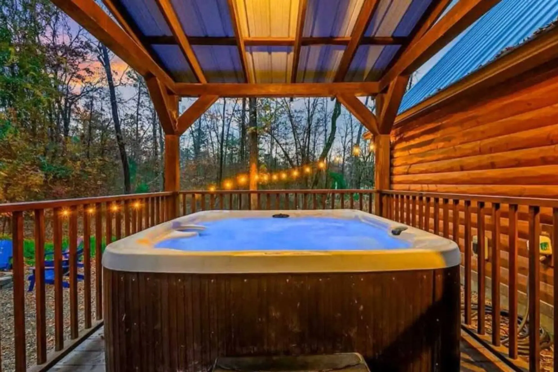 Unwind under the stars in the private covered hot tub
