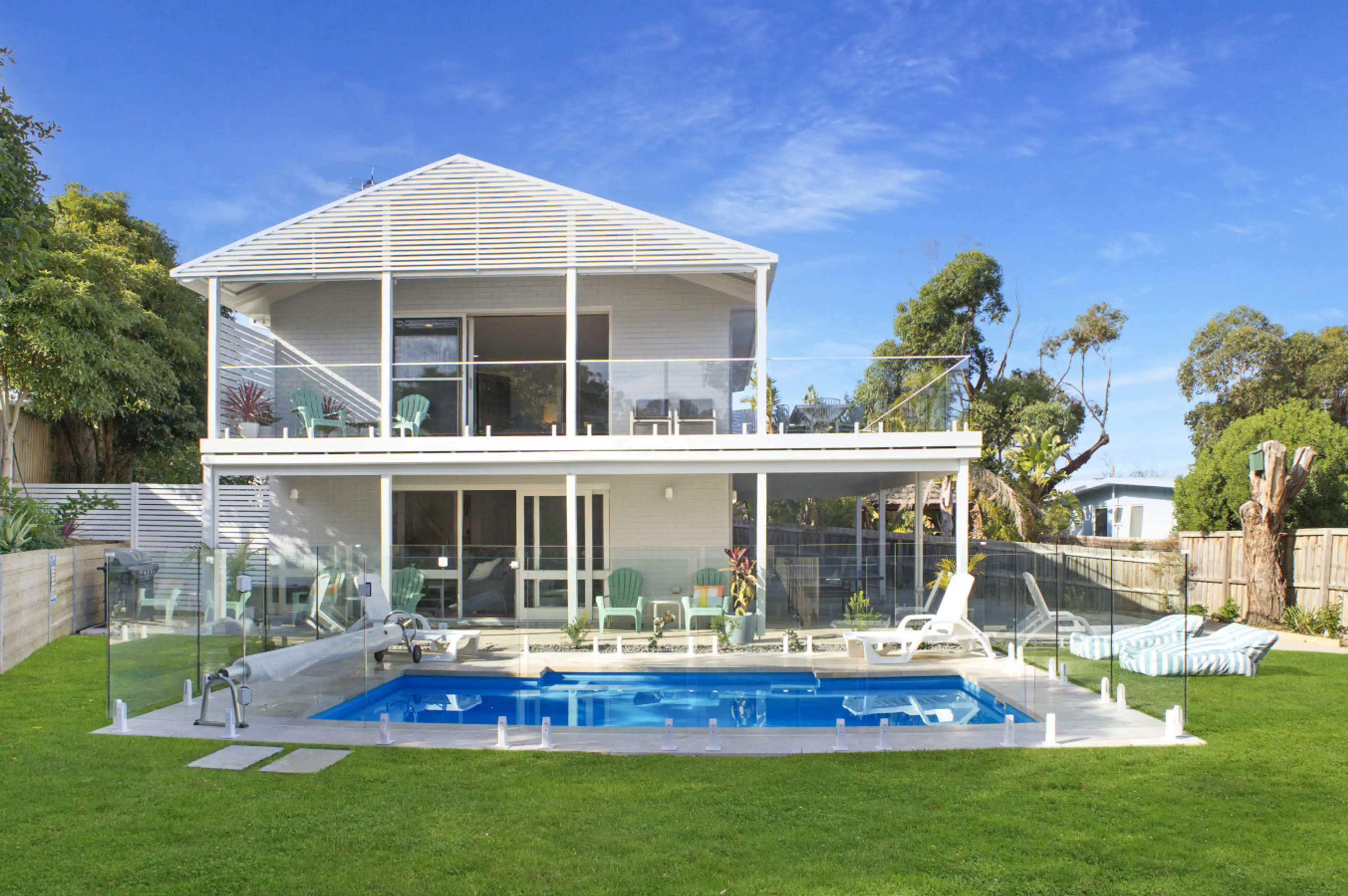 Spacious home with pool and open outdoor living, bright and inviting