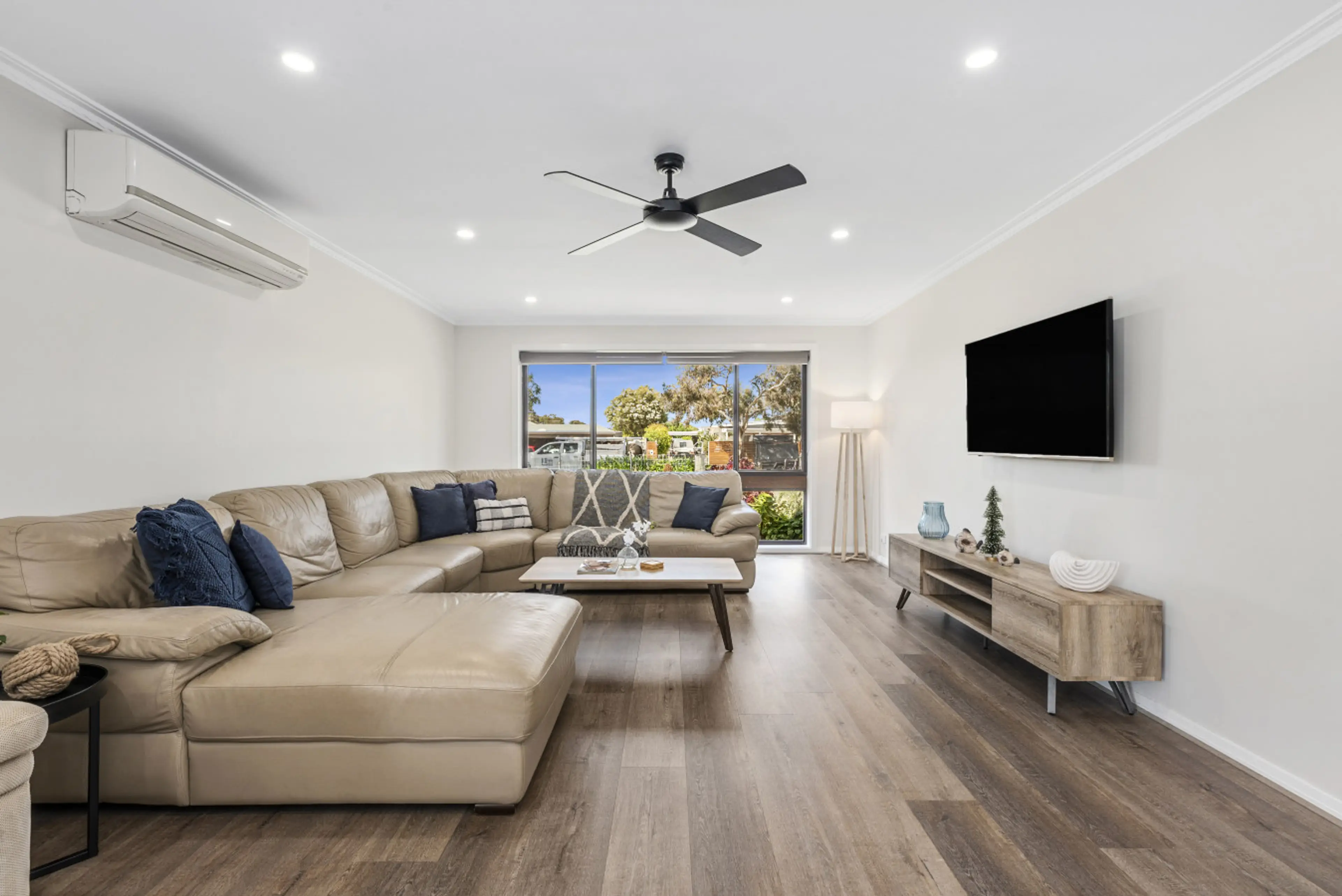 A cozy space to unwind—perfect for movie nights or simply relaxing in comfort.