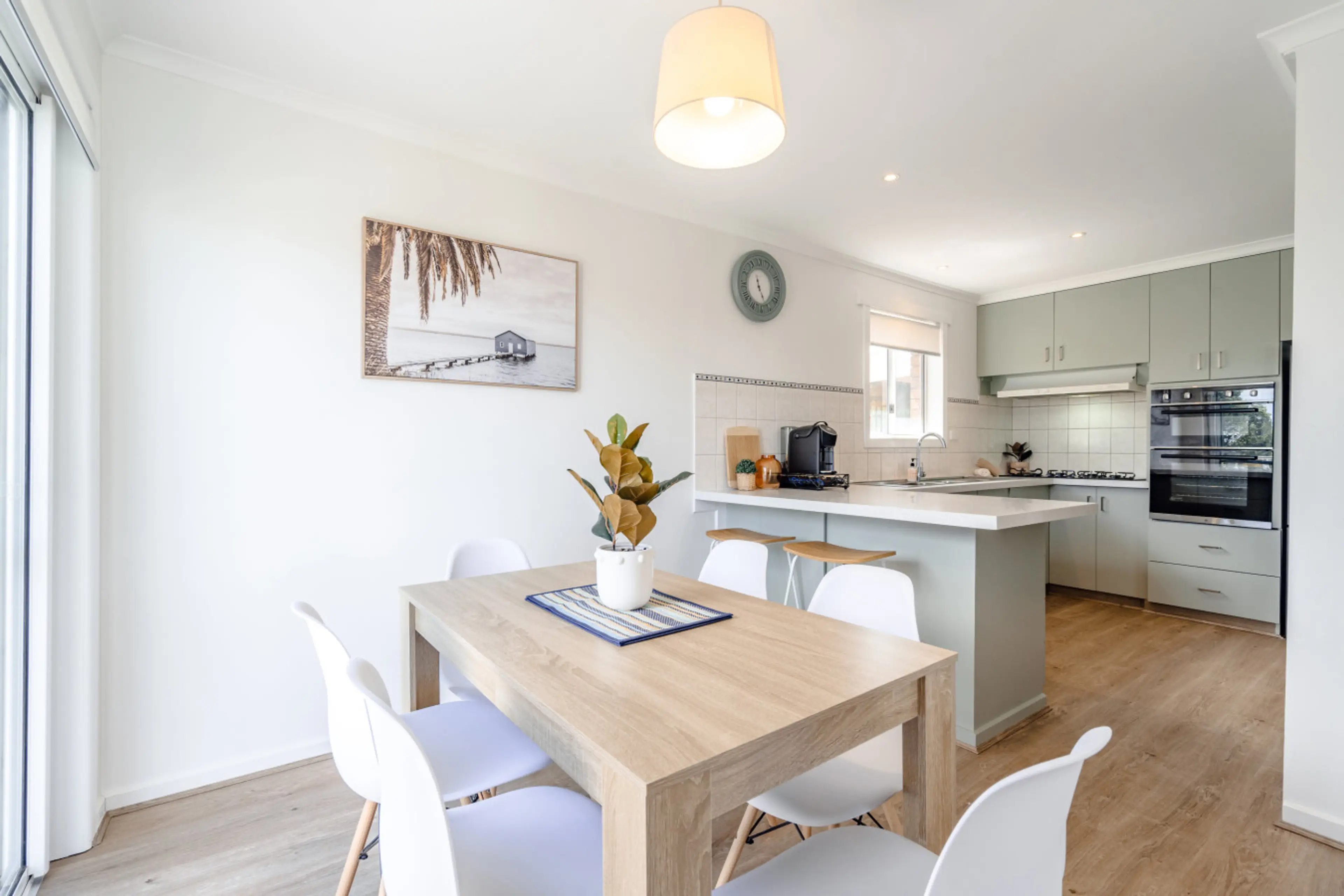 Light-filled dining area seamlessly connected to the kitchen.