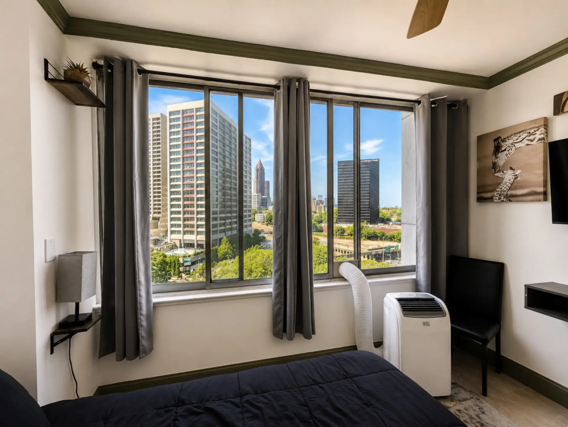 Wake up to Atlanta views! 🏙️✨ Enjoy bright natural light and city scenery right from your room—the perfect spot to relax after a day of exploring Atlanta.