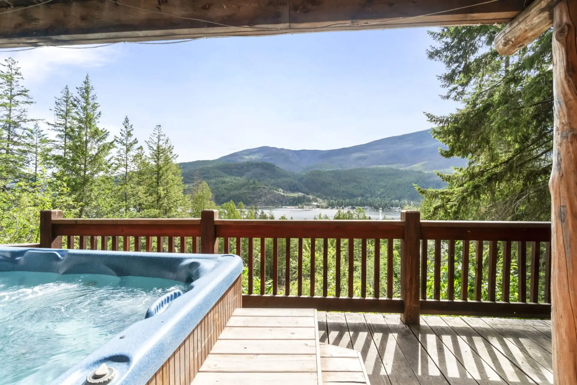 Hot Tub Retreat: Soak in luxury while enjoying stunning mountain and lake views!