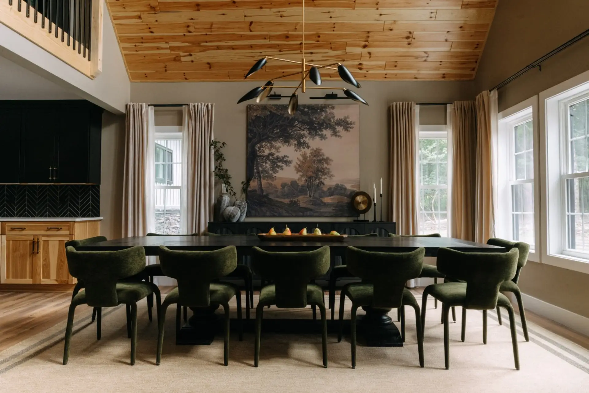 Gather here for the moments that become part of the trip. From breakfast before a day in the Poconos to dinner, drinks, and conversations that carry into the evening, this spacious dining room brings everyone together beneath soaring wood ceilings and nat