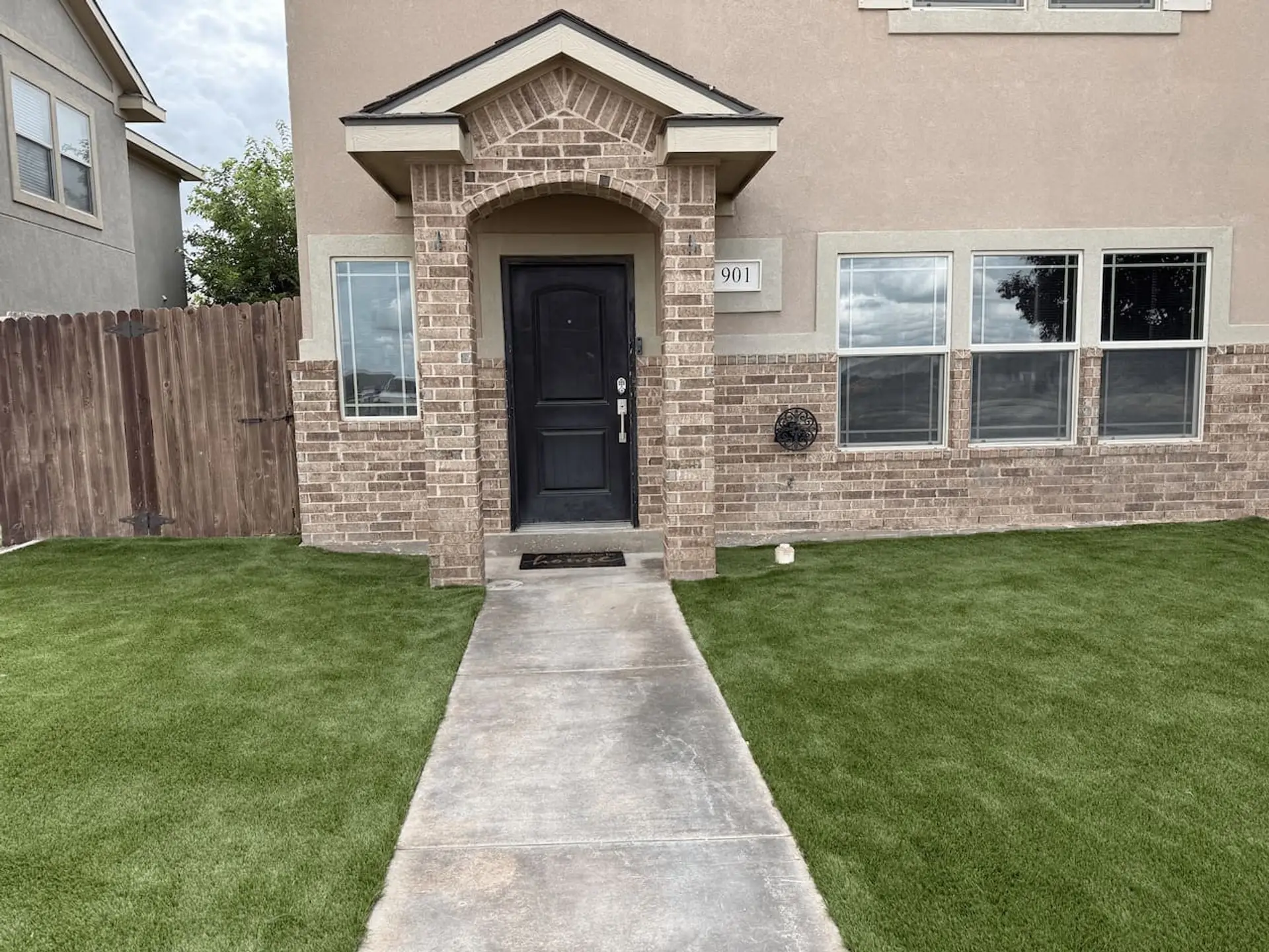 Welcome to Sunset Retreat — a freshly landscaped front yard with new turf and a clean, welcoming entry to your Odessa home away from home.
