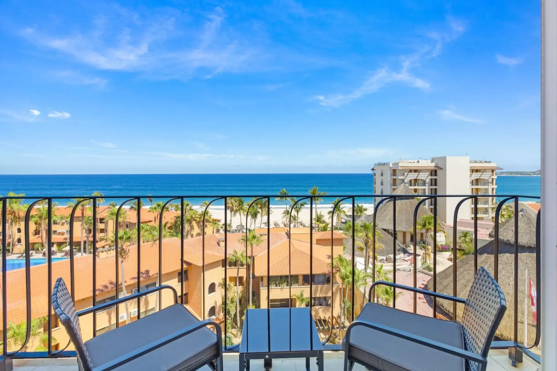 Private balcony with seating and sweeping views of the Sea of Cortez.