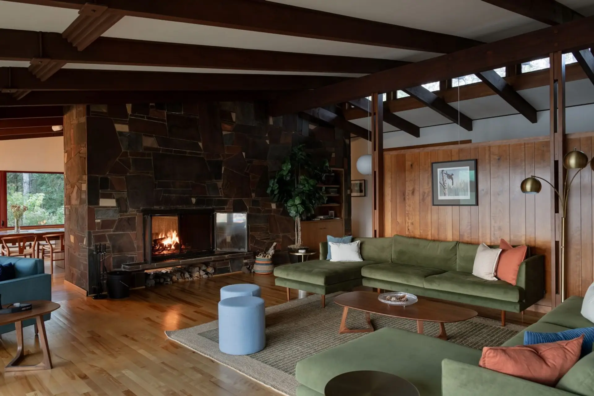 Somebody gets a fire going in the stone fireplace. The sectional fills up and nobody moves for a while.