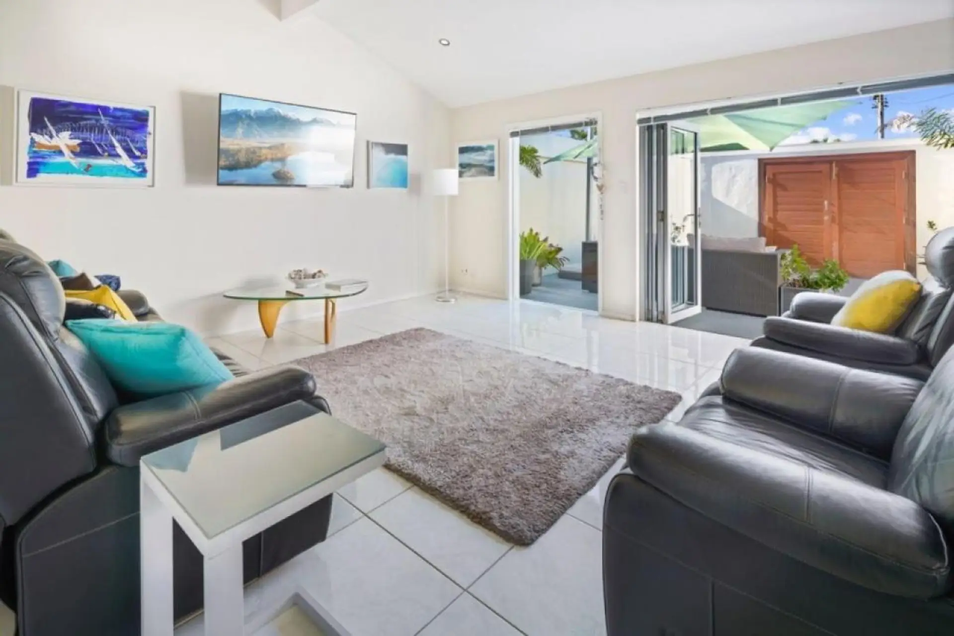 Living Room with bifold doors to the courtyard.