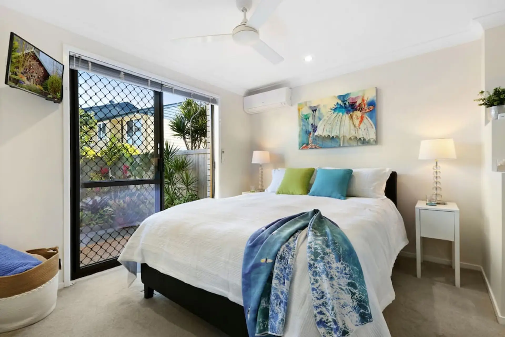 Relax after a day at the beach in the comfortable queen bed with quality linens which we supply for your convenience.