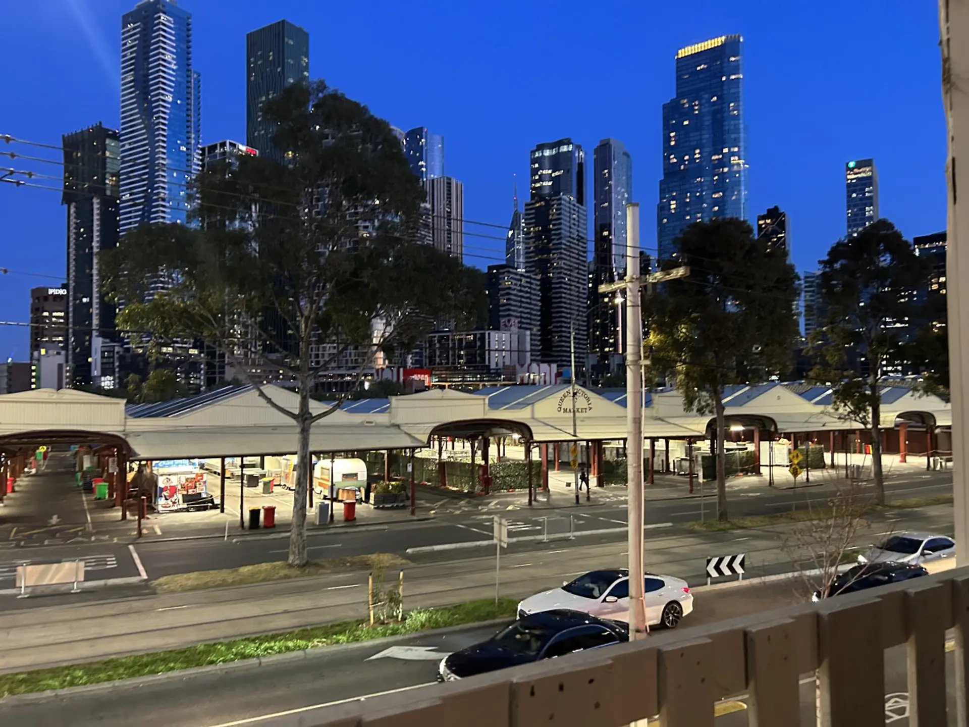 Actual view from the window of the apartment looking out over Queen Vic Markets at Melbourne CBD skyline.