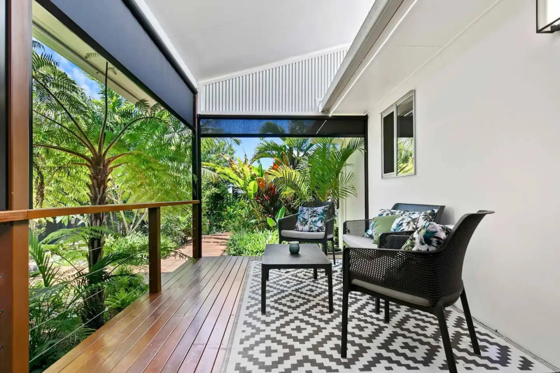 Relax on the private covered deck surrounded by lush tropical gardens.